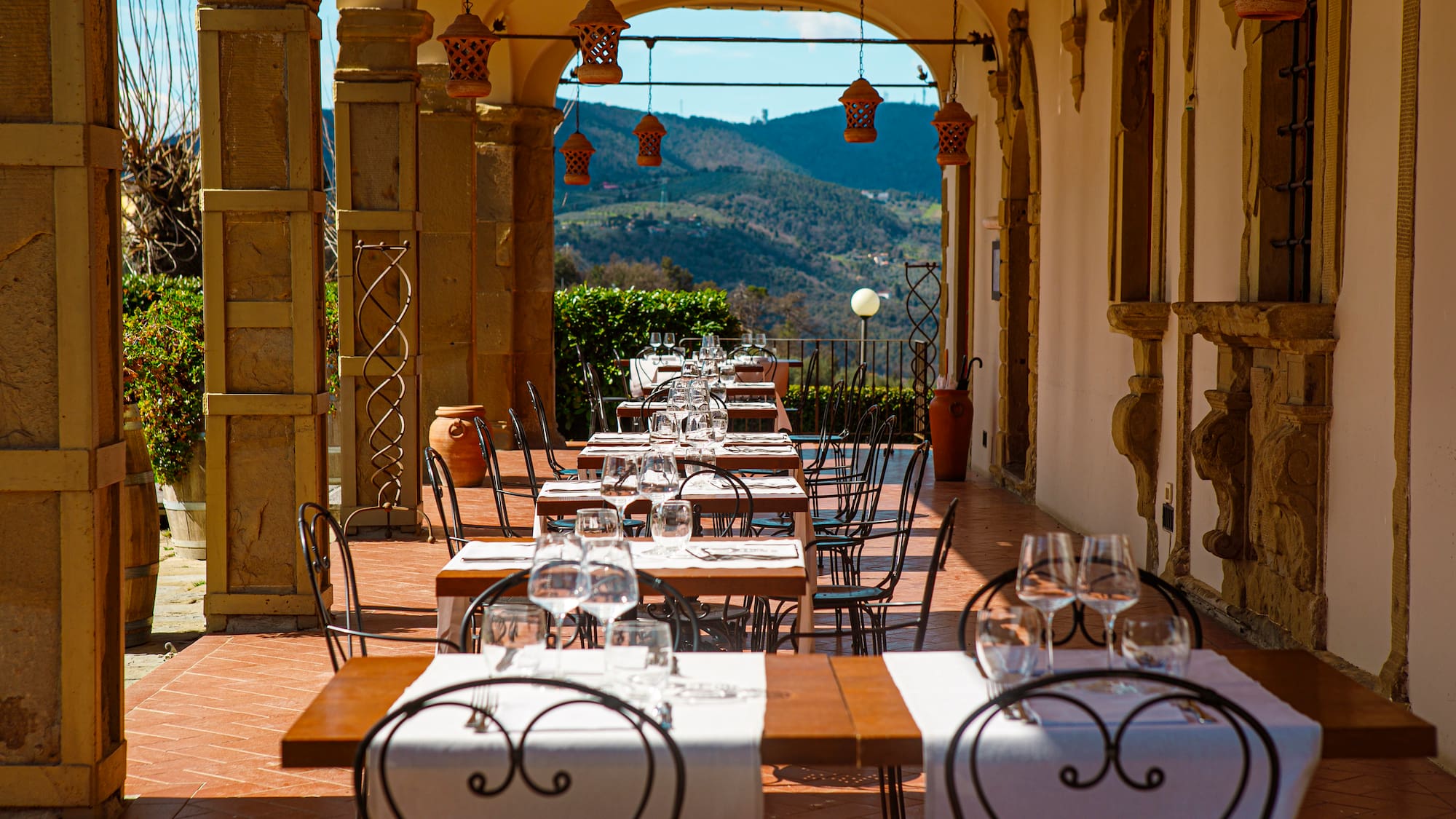 a restaurant with tables and chairs