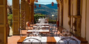 a restaurant with tables and chairs