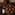 Poggilarca Carmignano red wine bottle, vintage copper pots, rustic shelf.