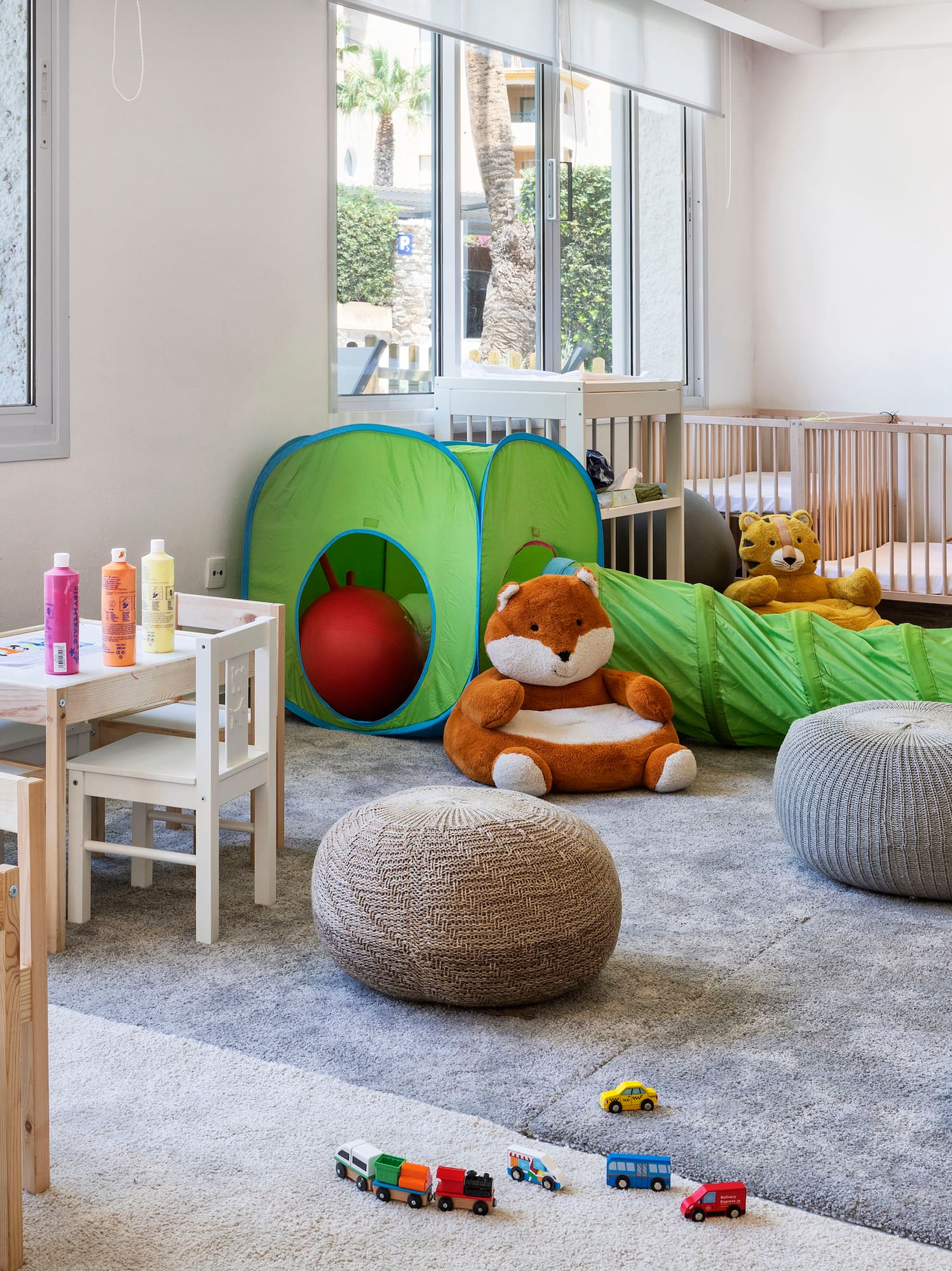 a room with toys and a playroom