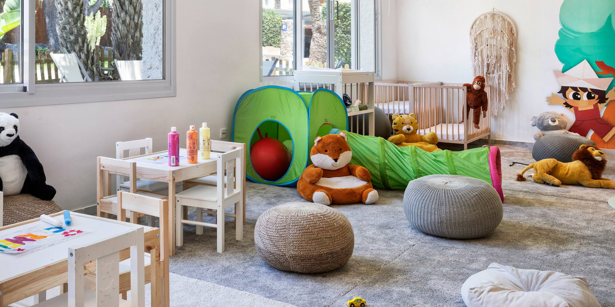 a room with toys and a playroom