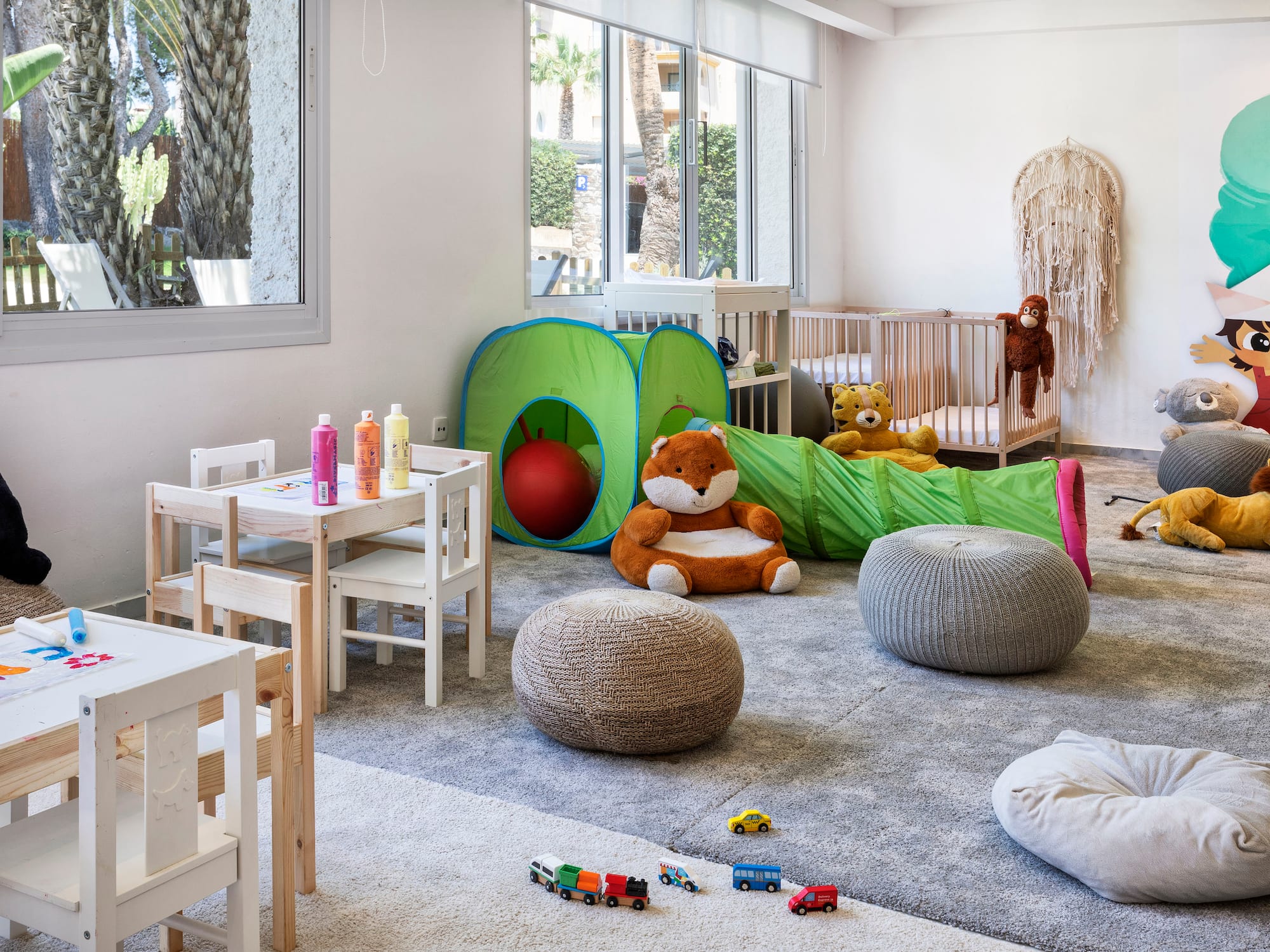 a room with toys and a playroom