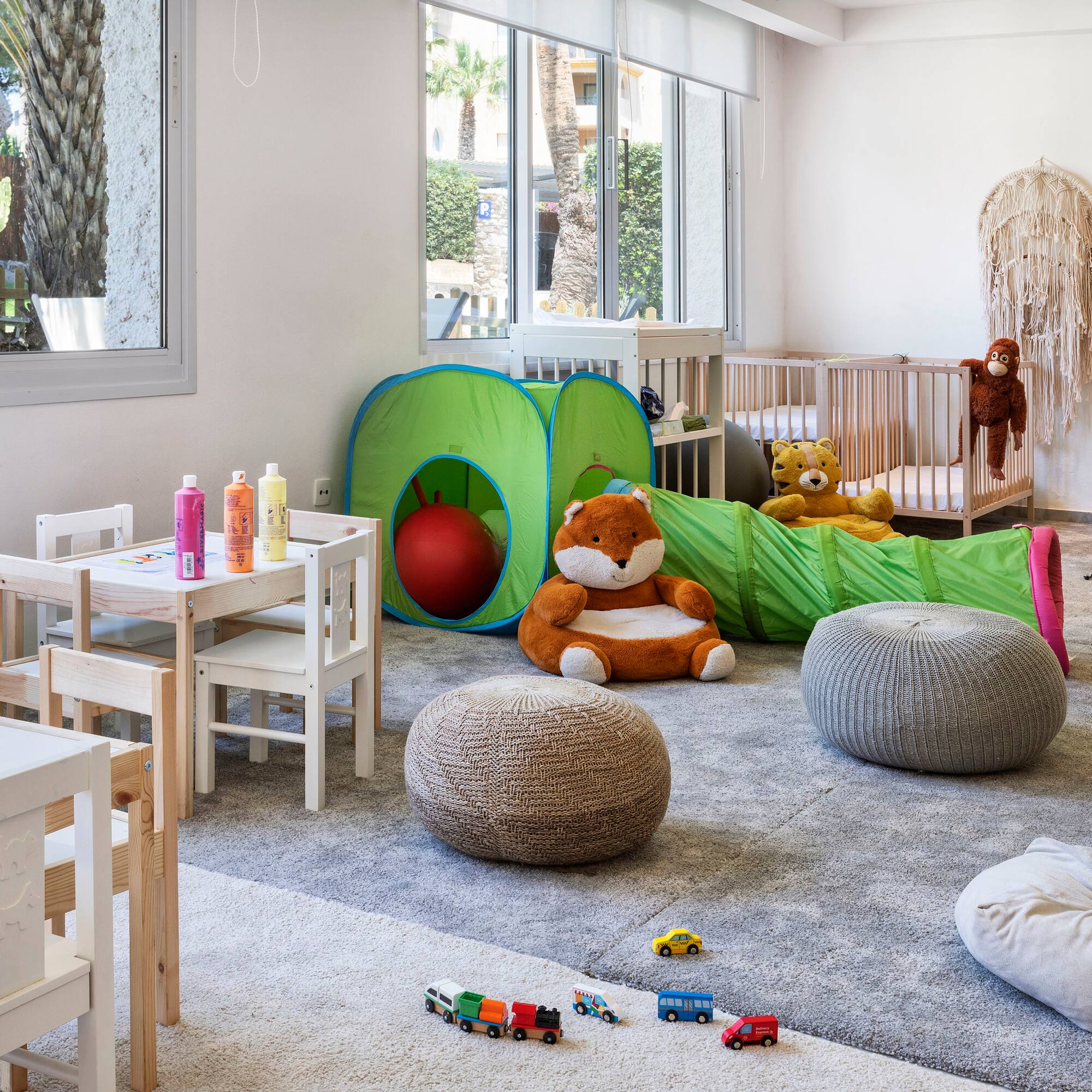 a room with toys and a playroom