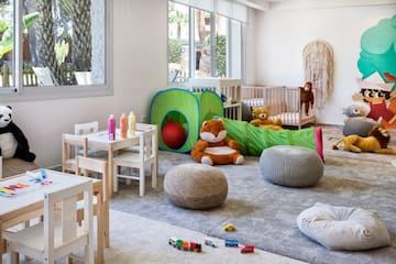 a room with toys and a playroom