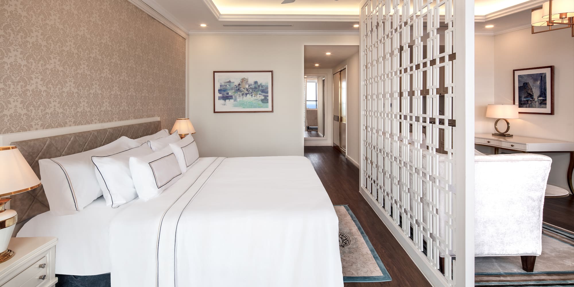 a room with a bed and a ceiling fan