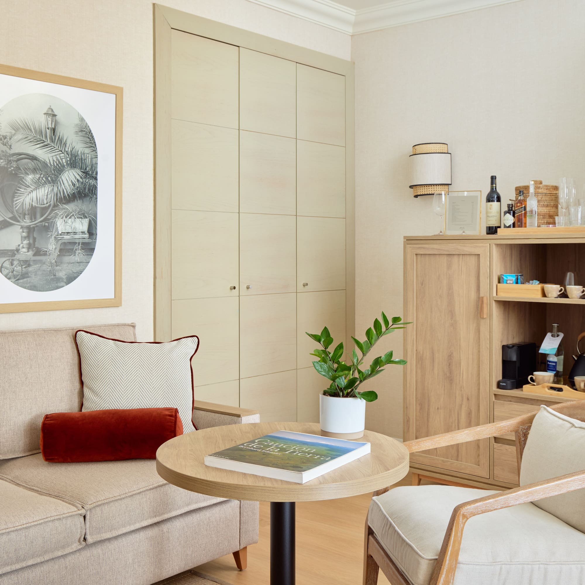 a living room with a couch and a table