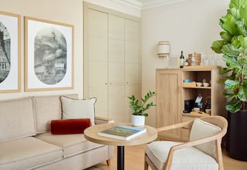 a living room with a couch and a table