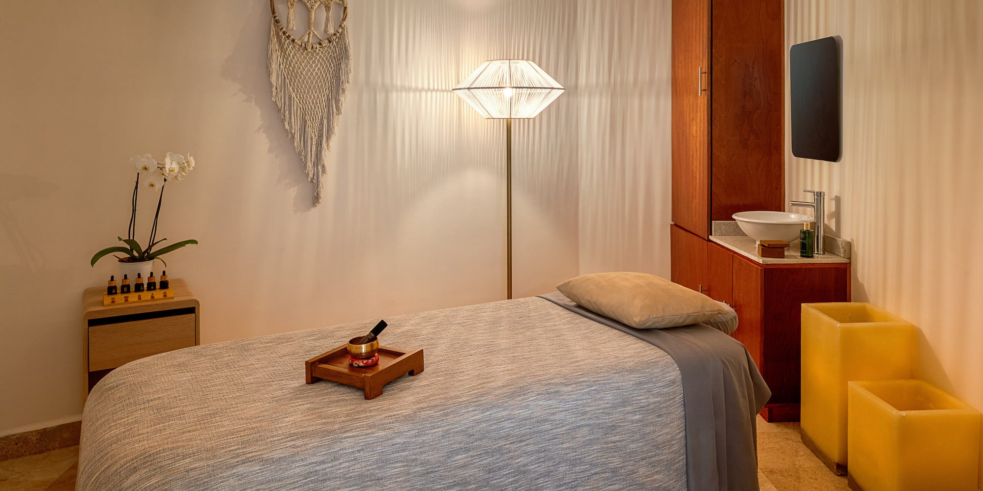 a room with a bed and a mirror