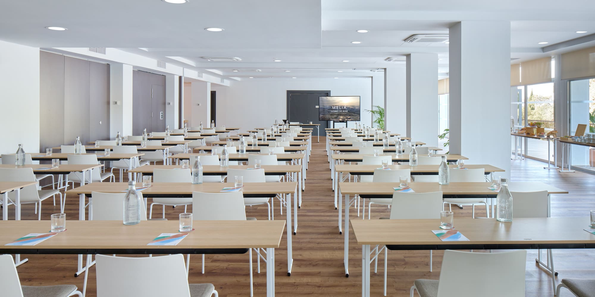 a room with tables and chairs