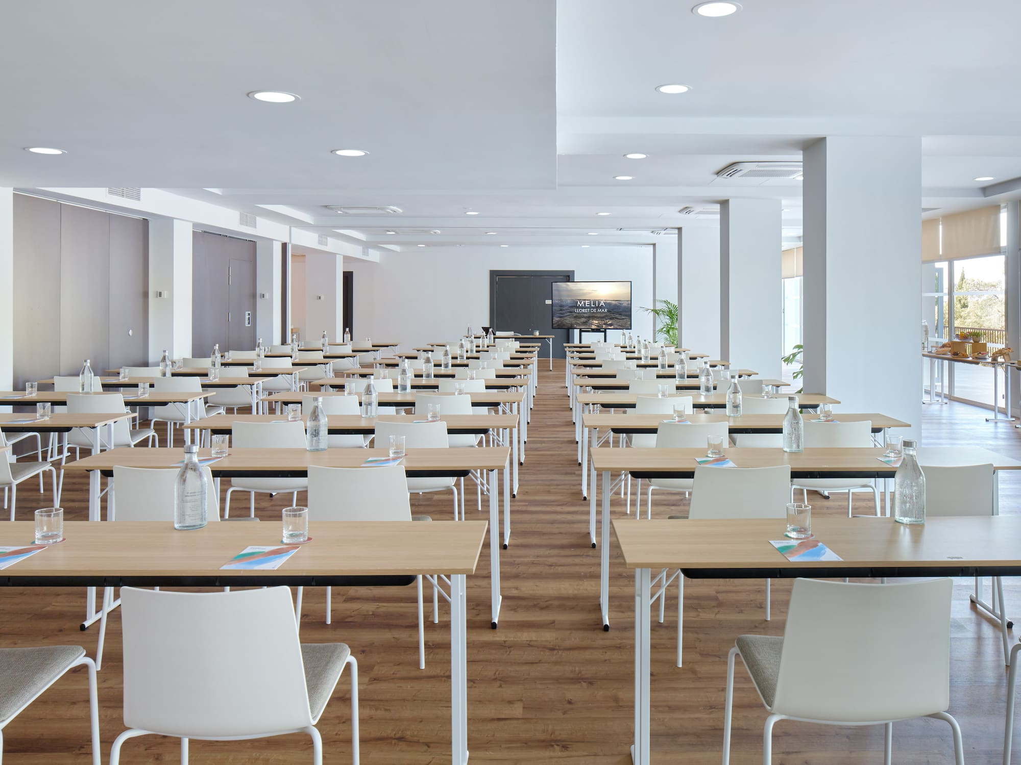 a room with tables and chairs