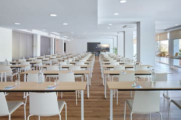 a room with tables and chairs