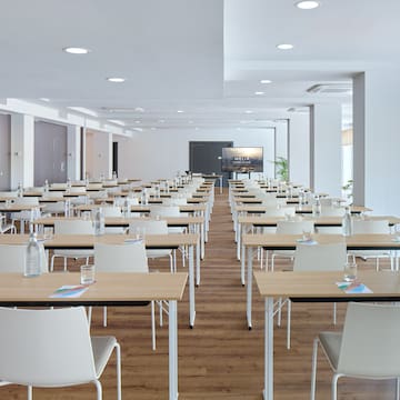 a room with tables and chairs