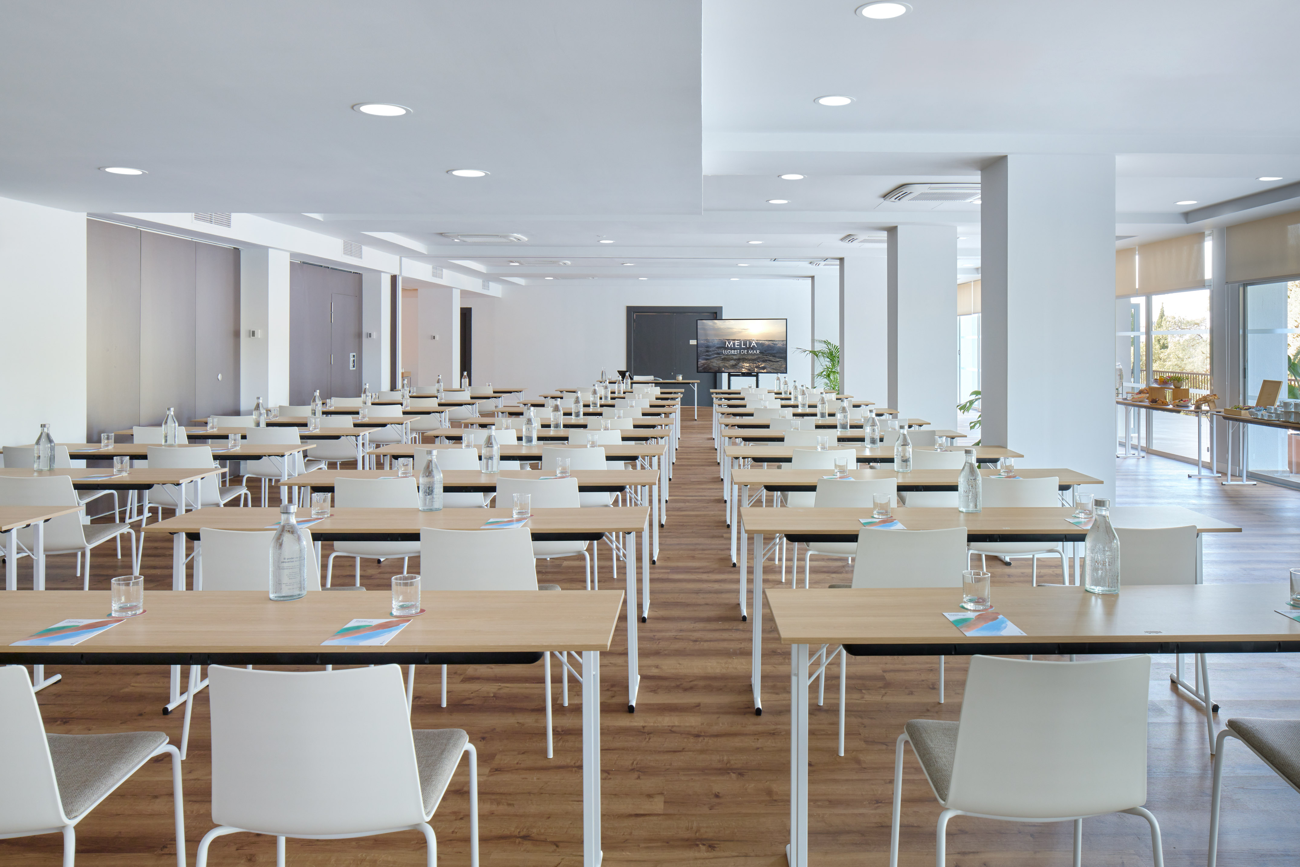 a room with tables and chairs