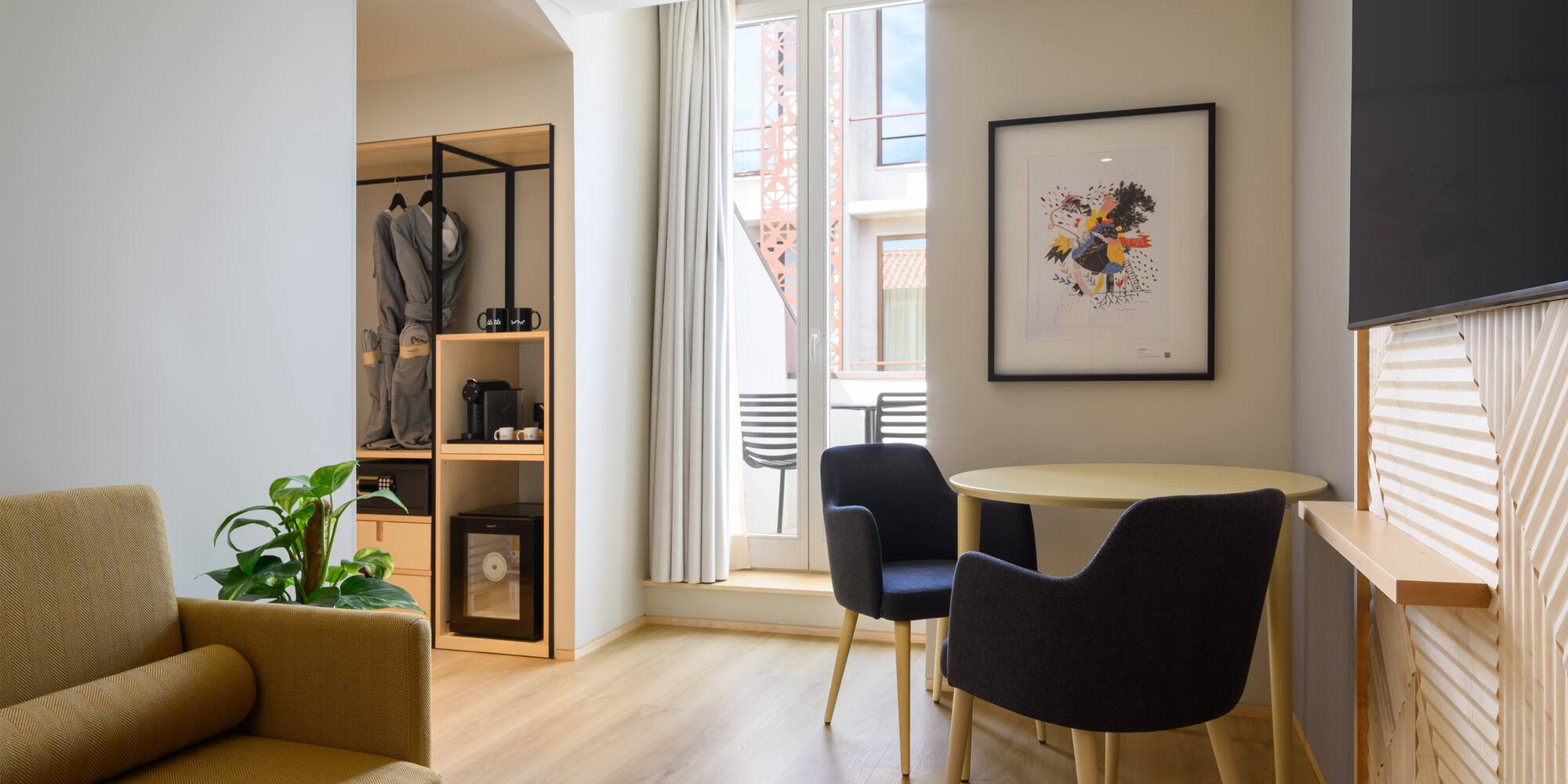 a room with a table and chairs