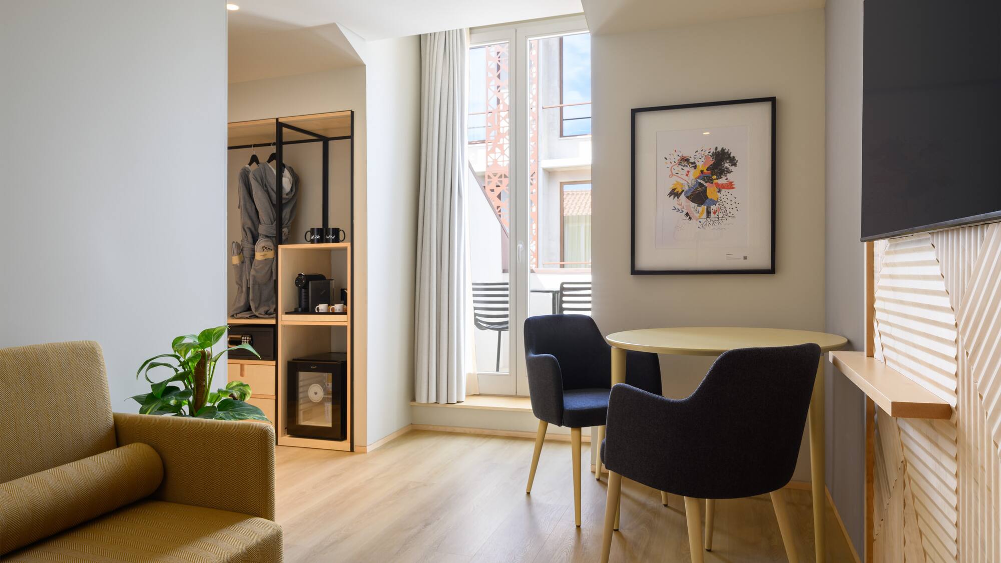 a room with a table and chairs