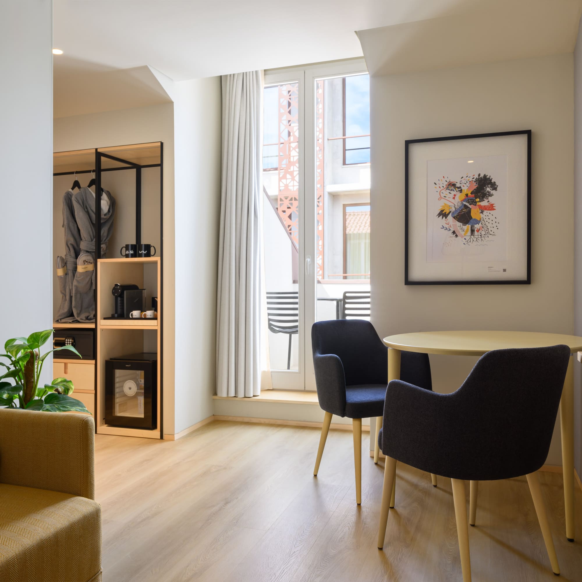 a room with a table and chairs