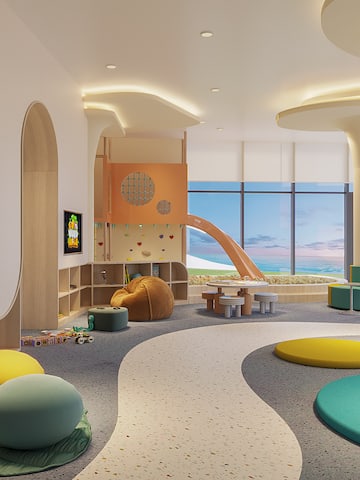 a room with a slide and a playroom