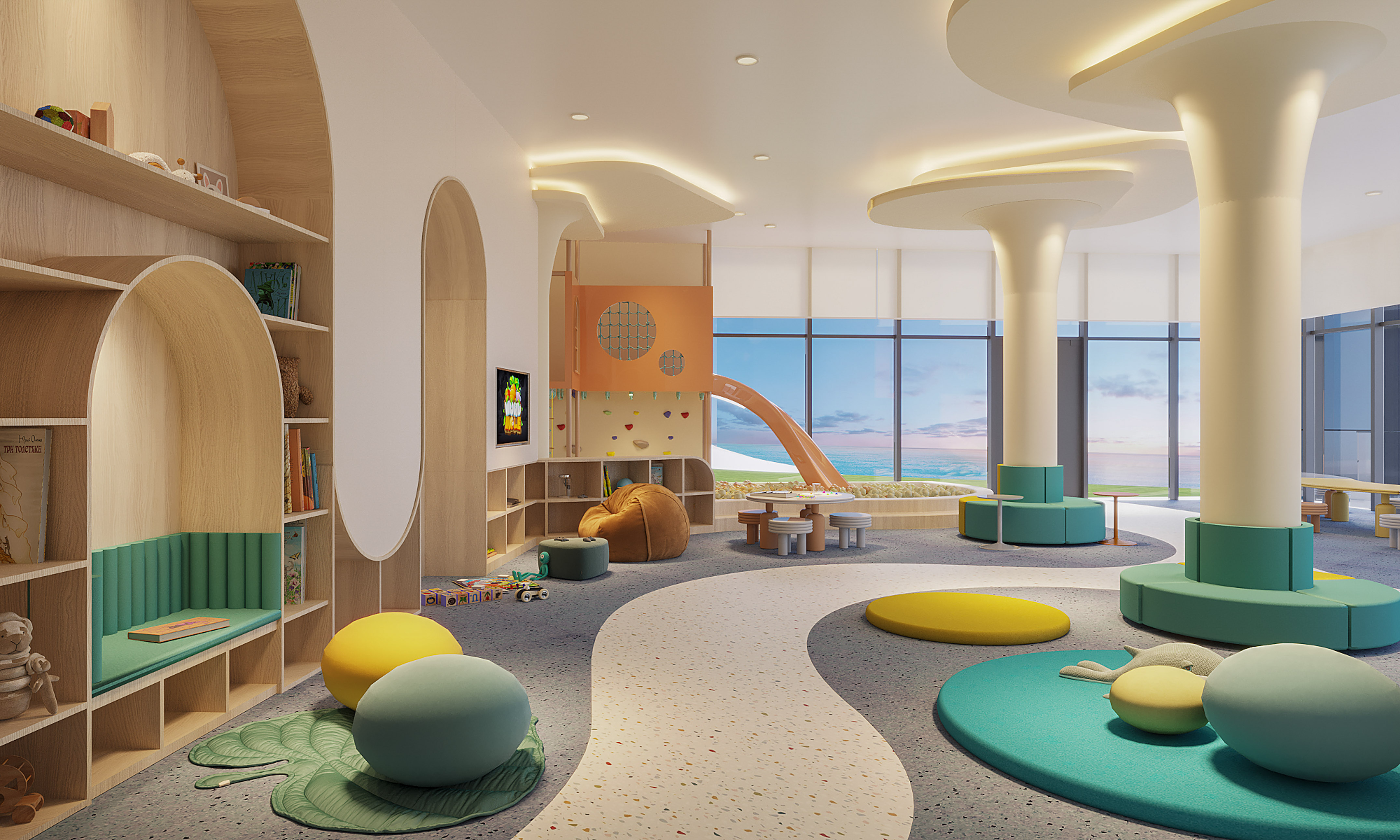Colorful kids' play area with indoor slide, reading nook, and ocean view.