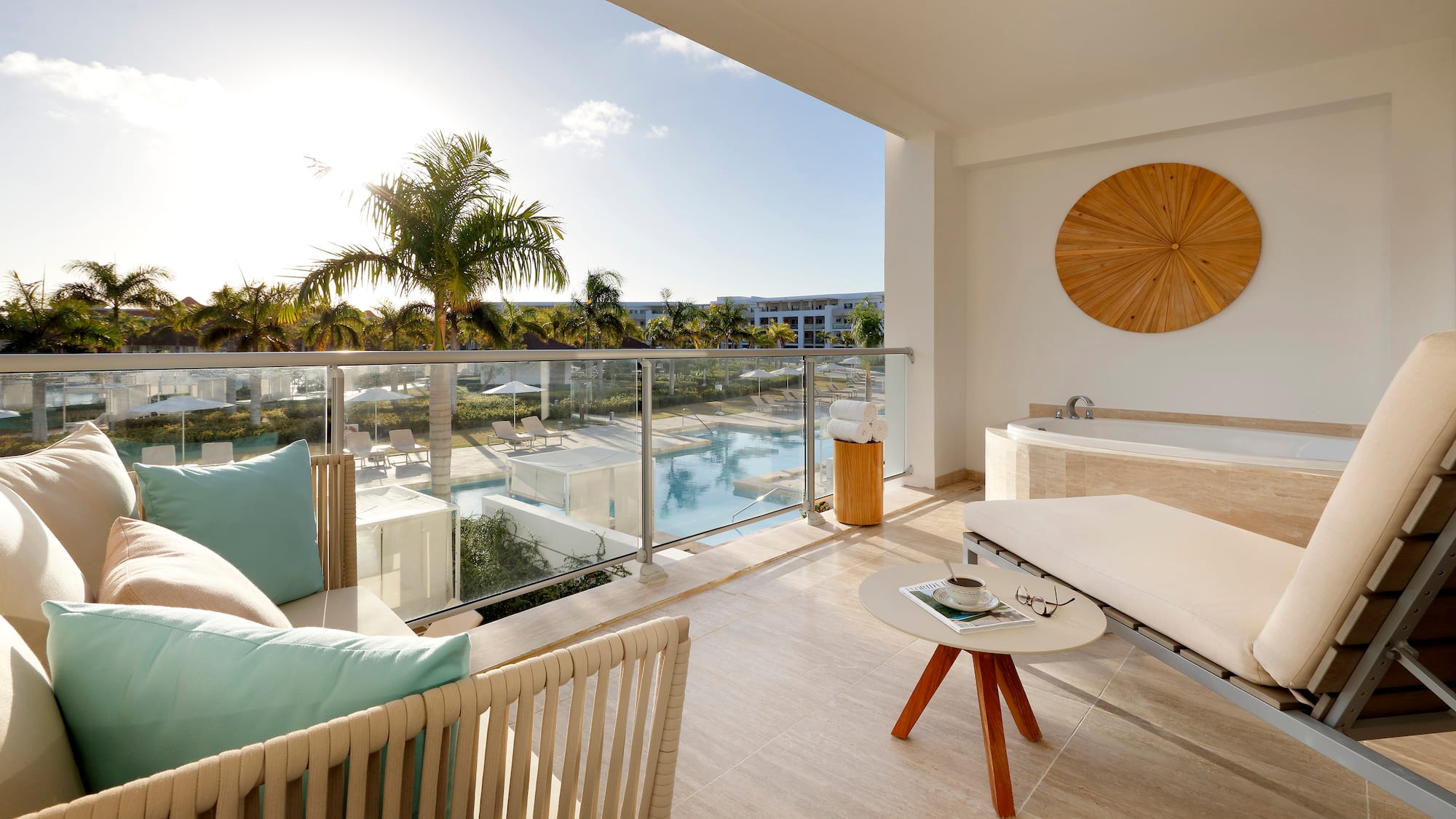 a balcony with a hot tub and a jacuzzi