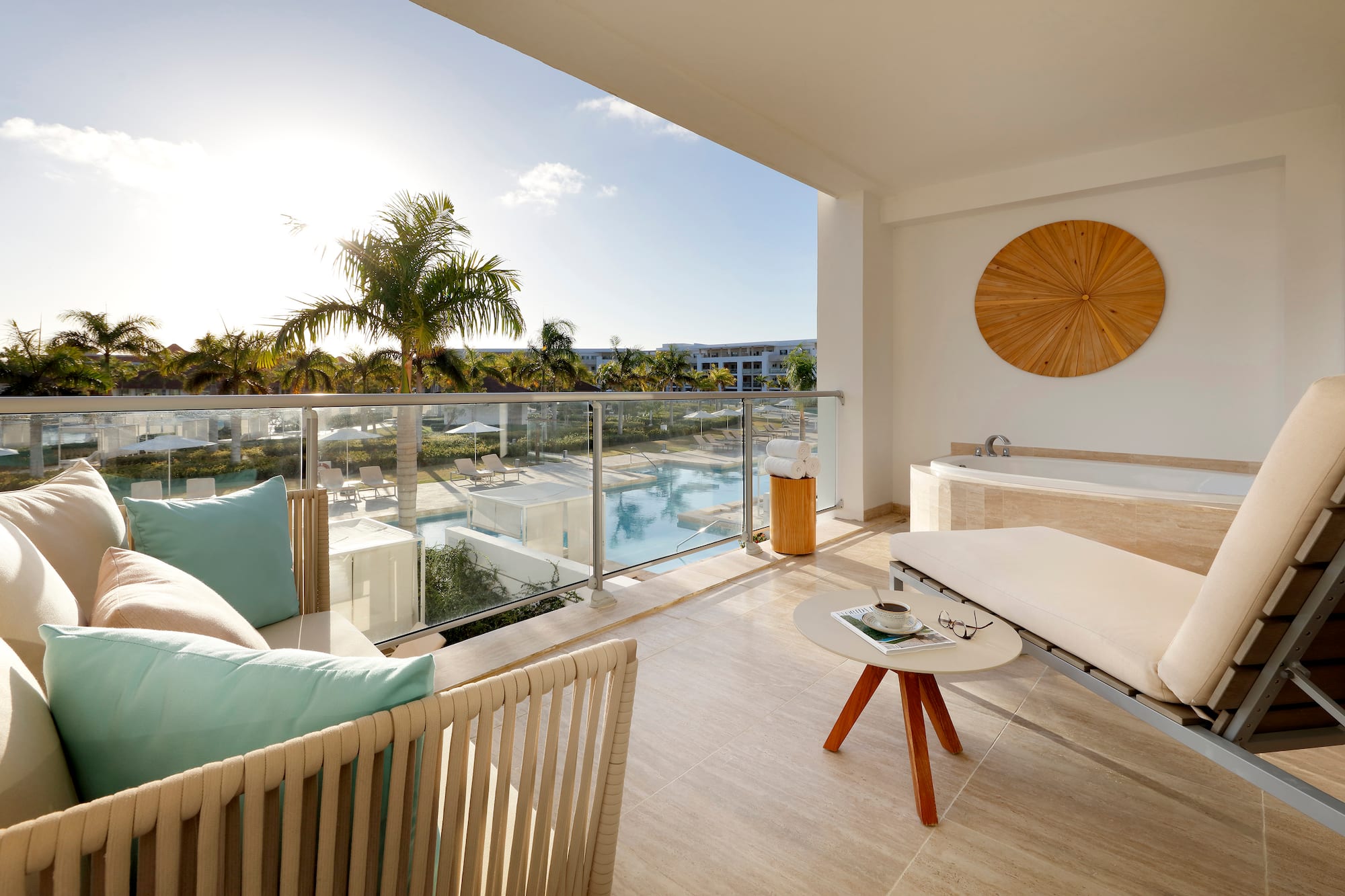 a balcony with a hot tub and a jacuzzi