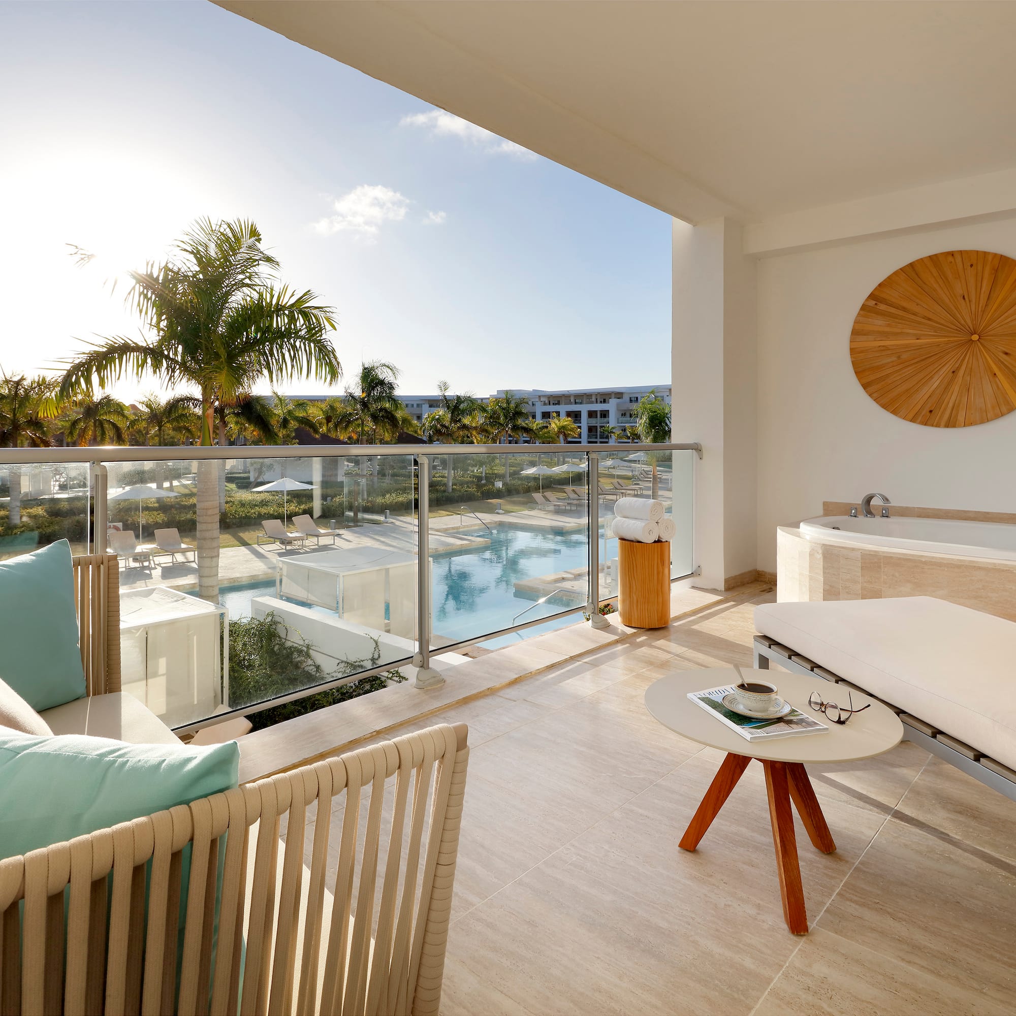 a balcony with a pool and a couch