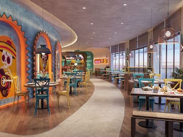 a restaurant with tables and chairs