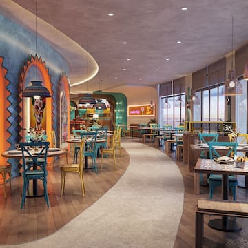 a restaurant with tables and chairs