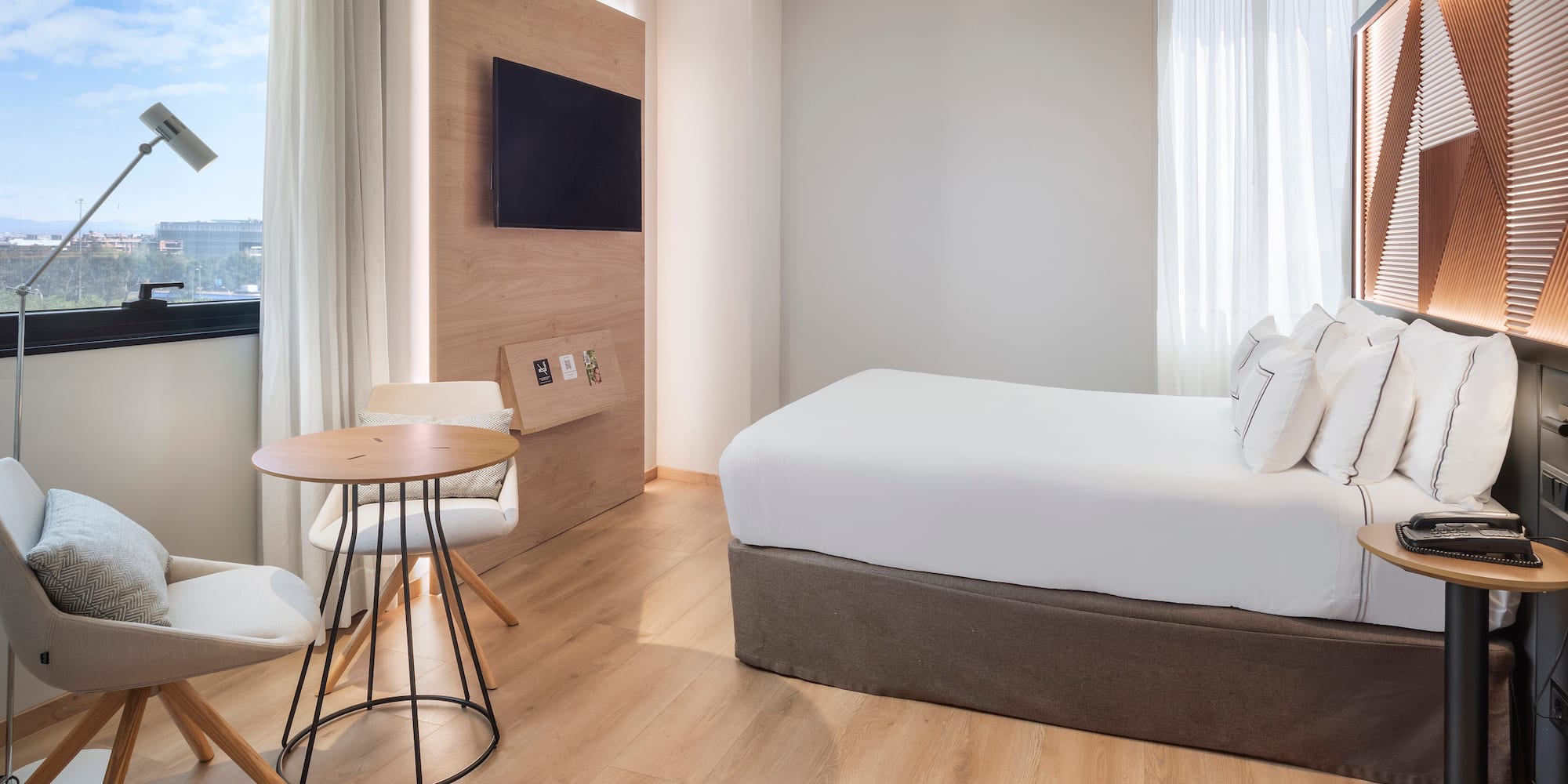 a room with a bed and a table