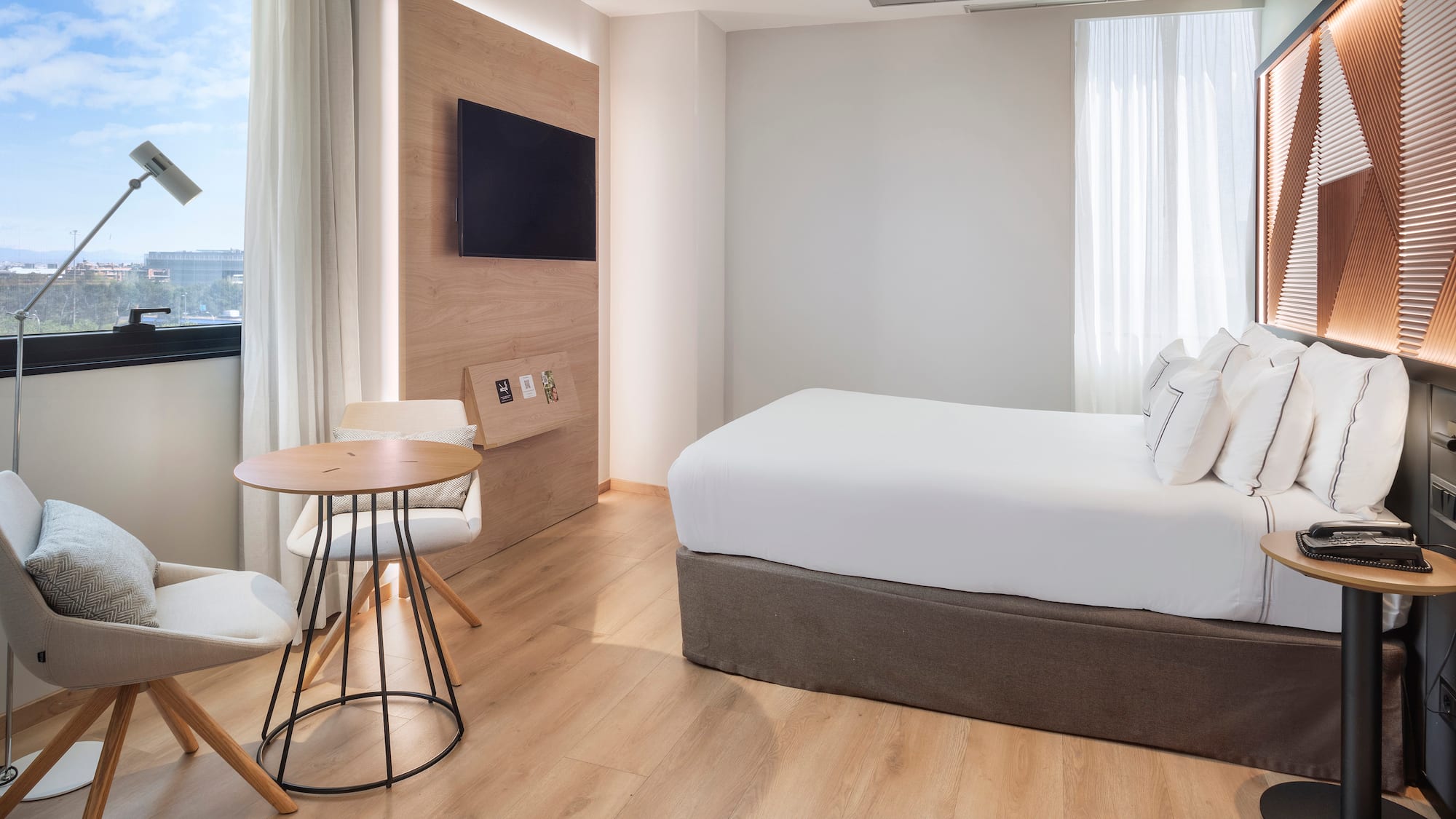 a room with a bed and a table