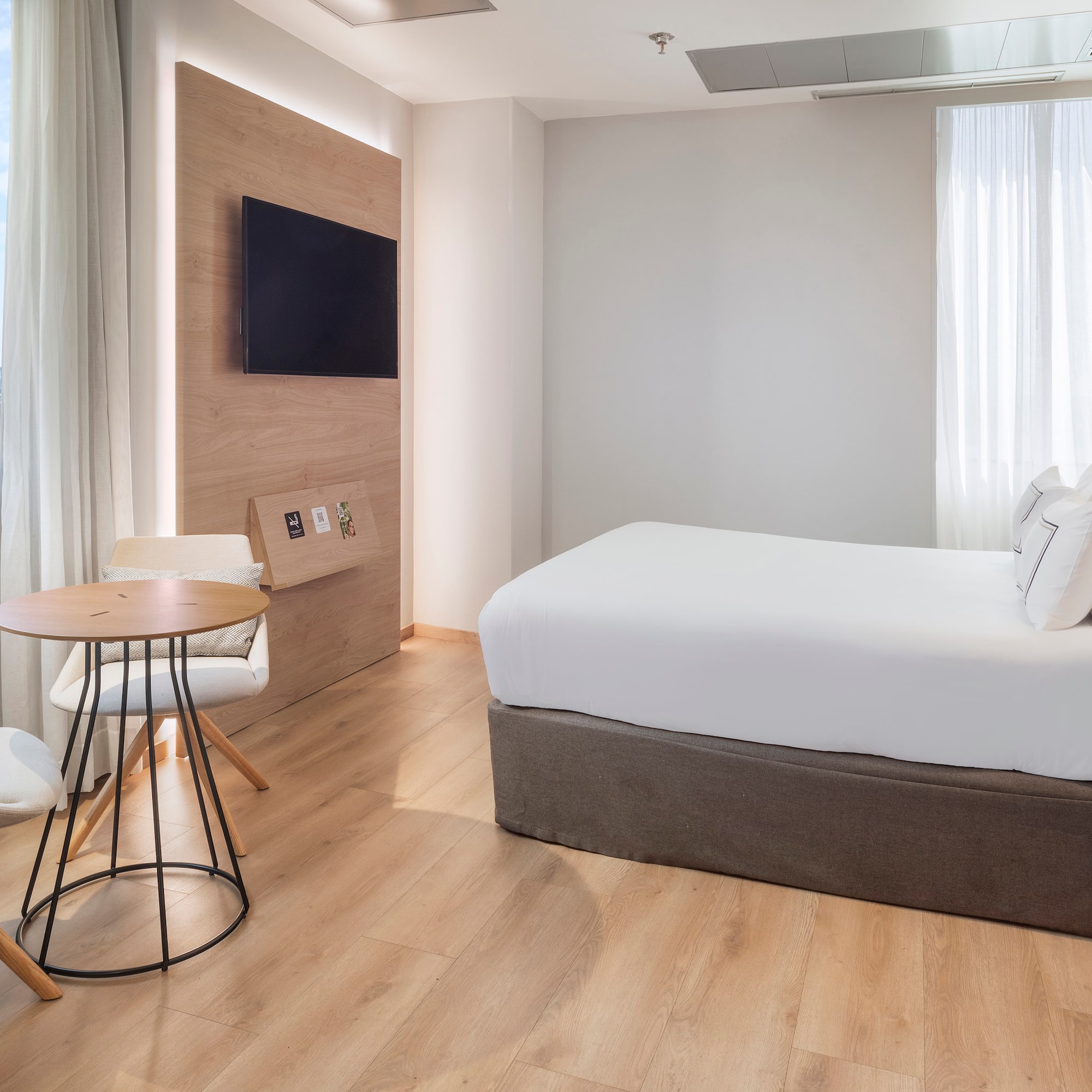 a room with a bed and a table