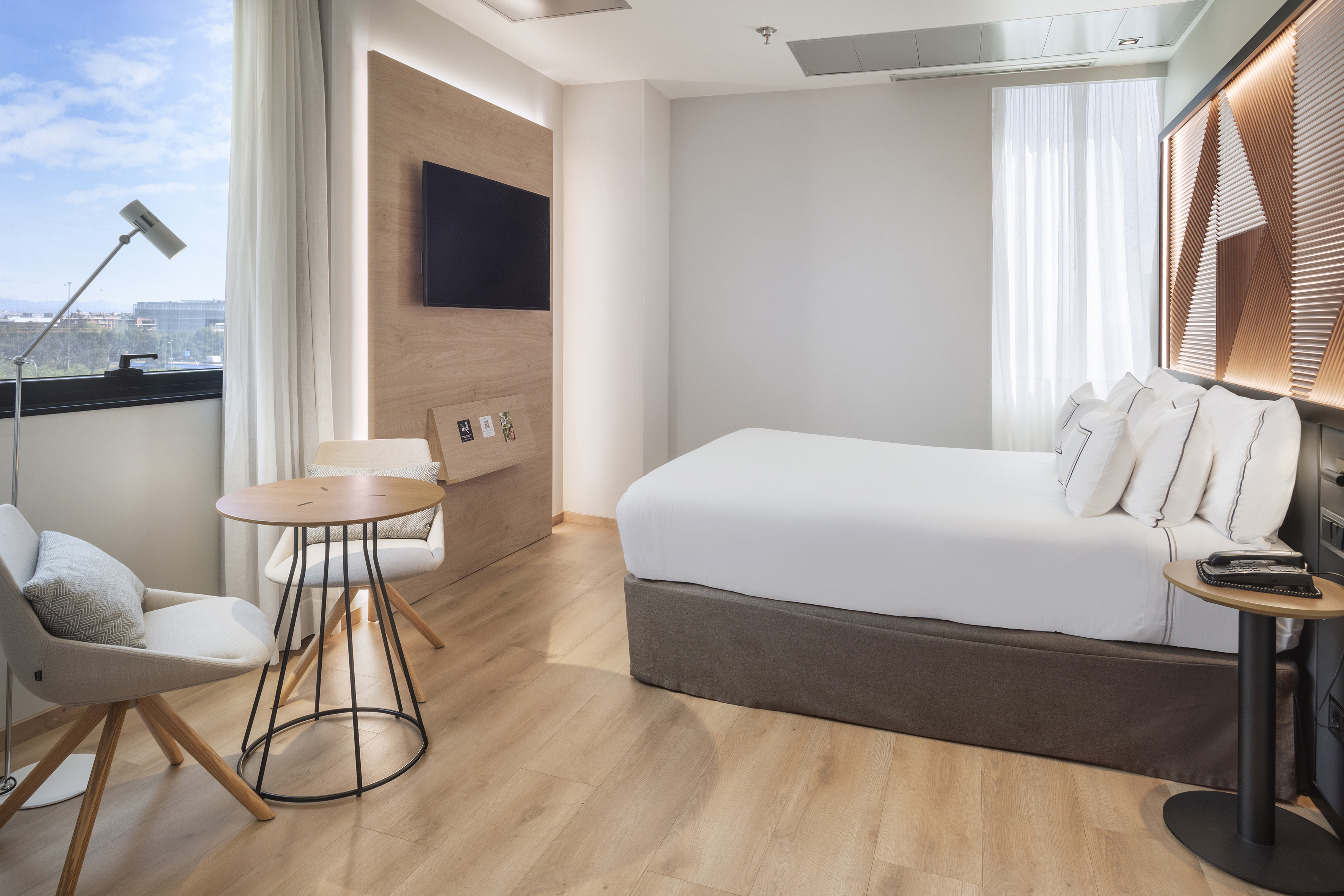 a room with a bed and a table