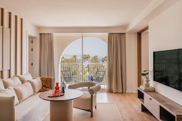 a living room with a television and a couch