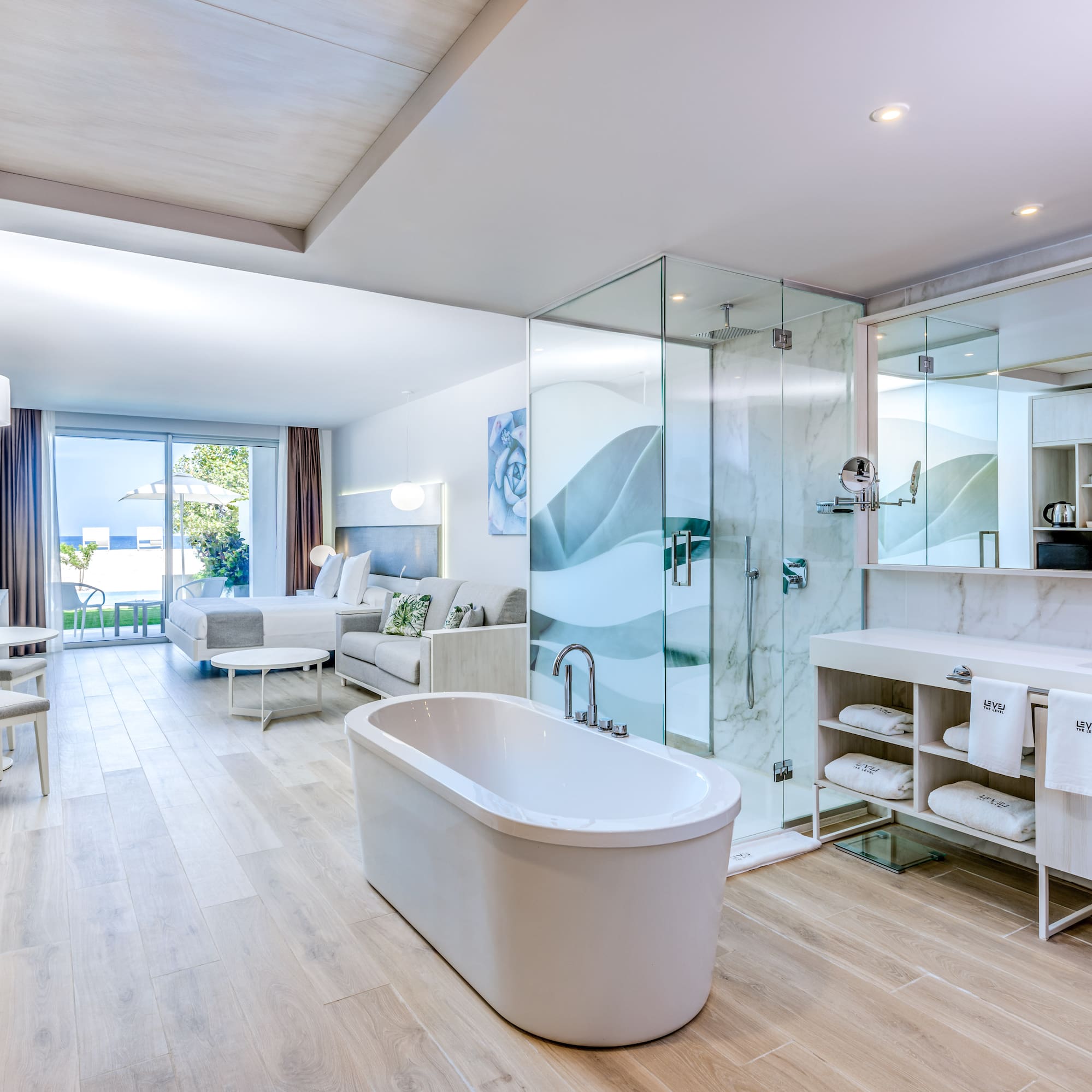 a bathroom with a tub and a shower