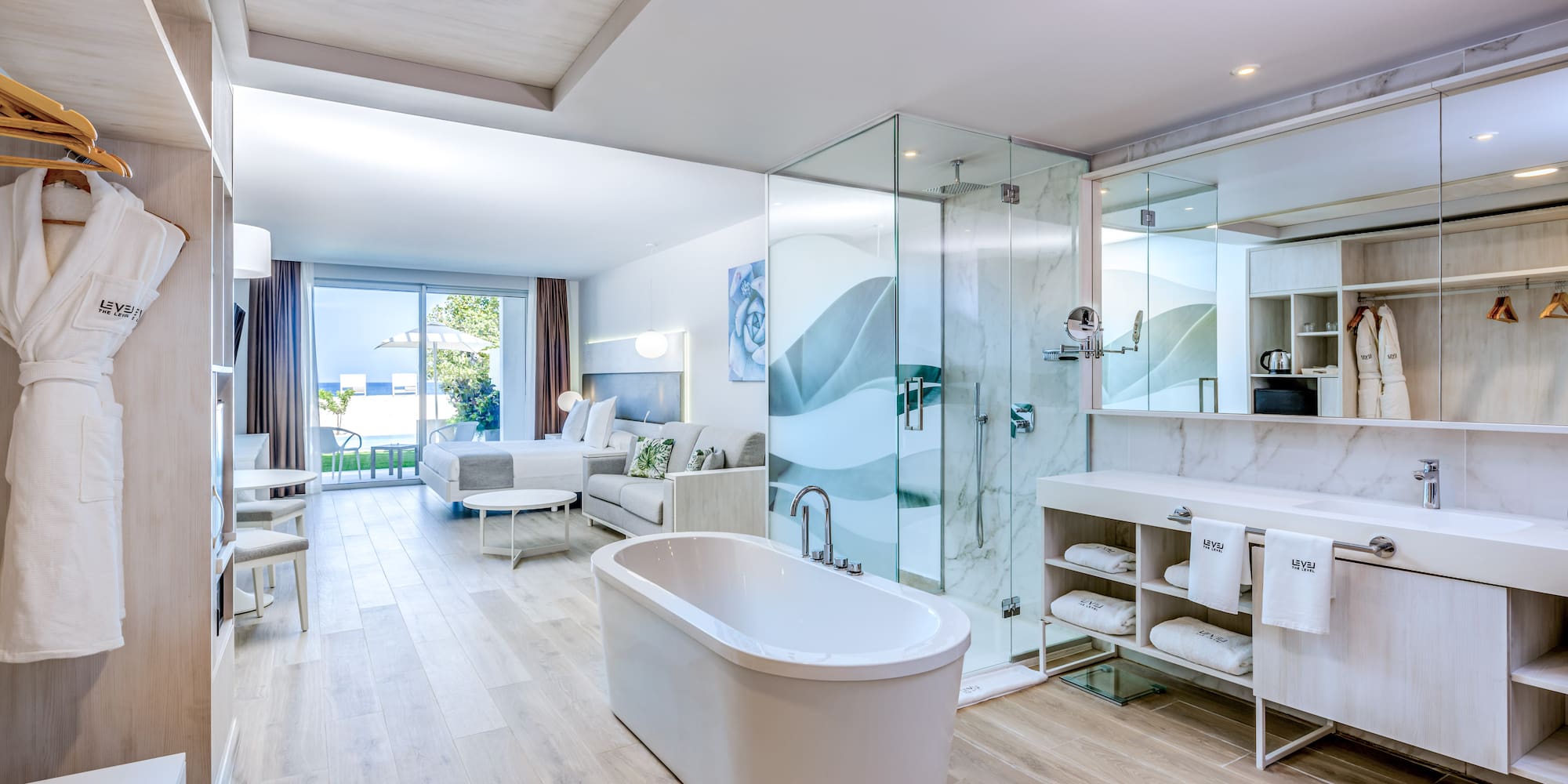 a bathroom with a tub and a shower