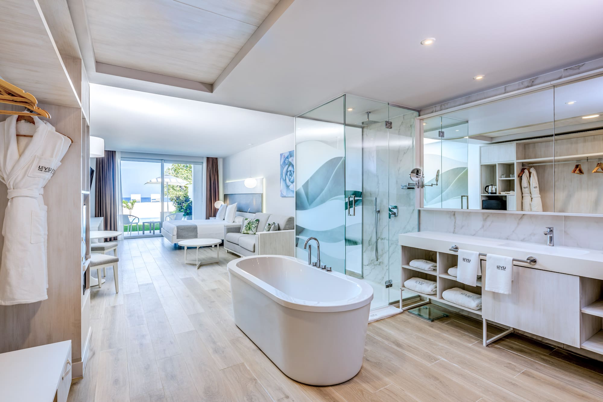 a bathroom with a tub and a shower