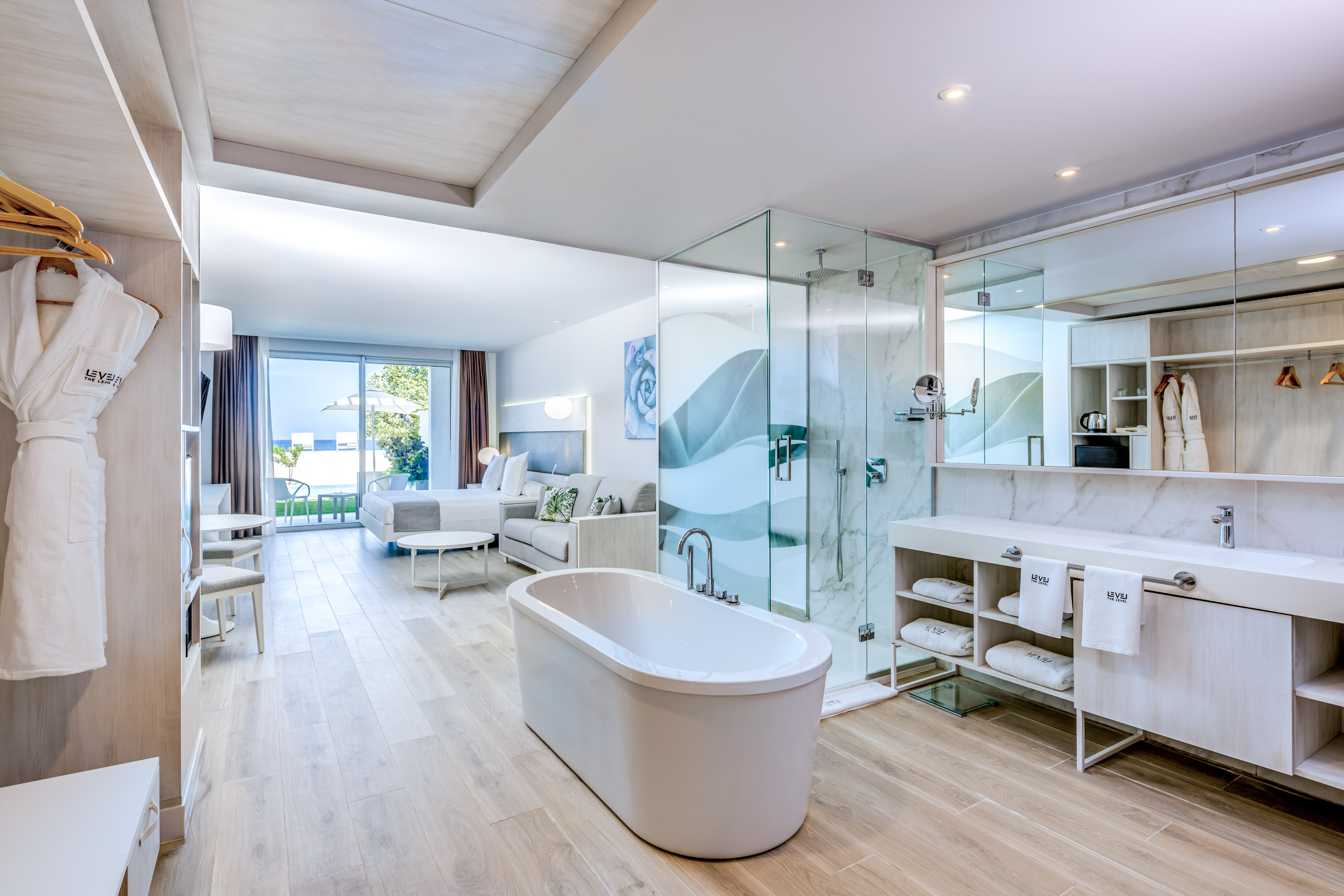 a bathroom with a tub and a shower