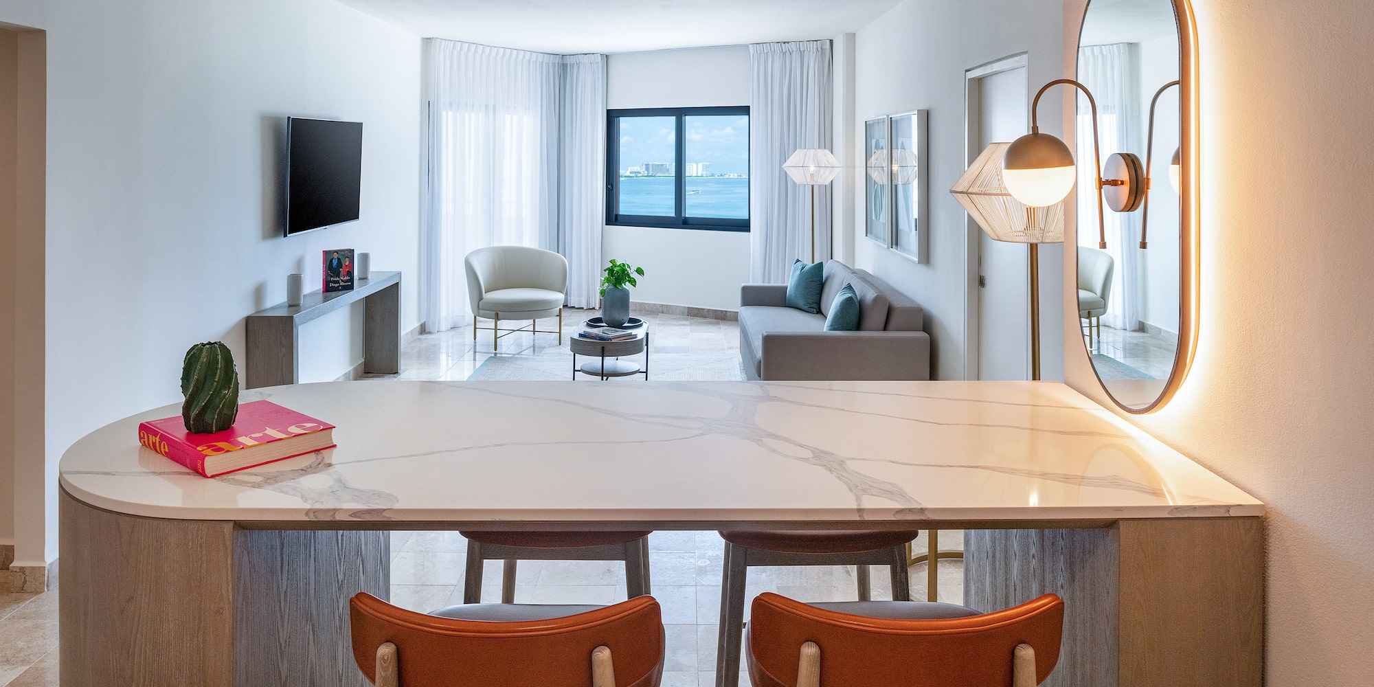 a room with a table and chairs