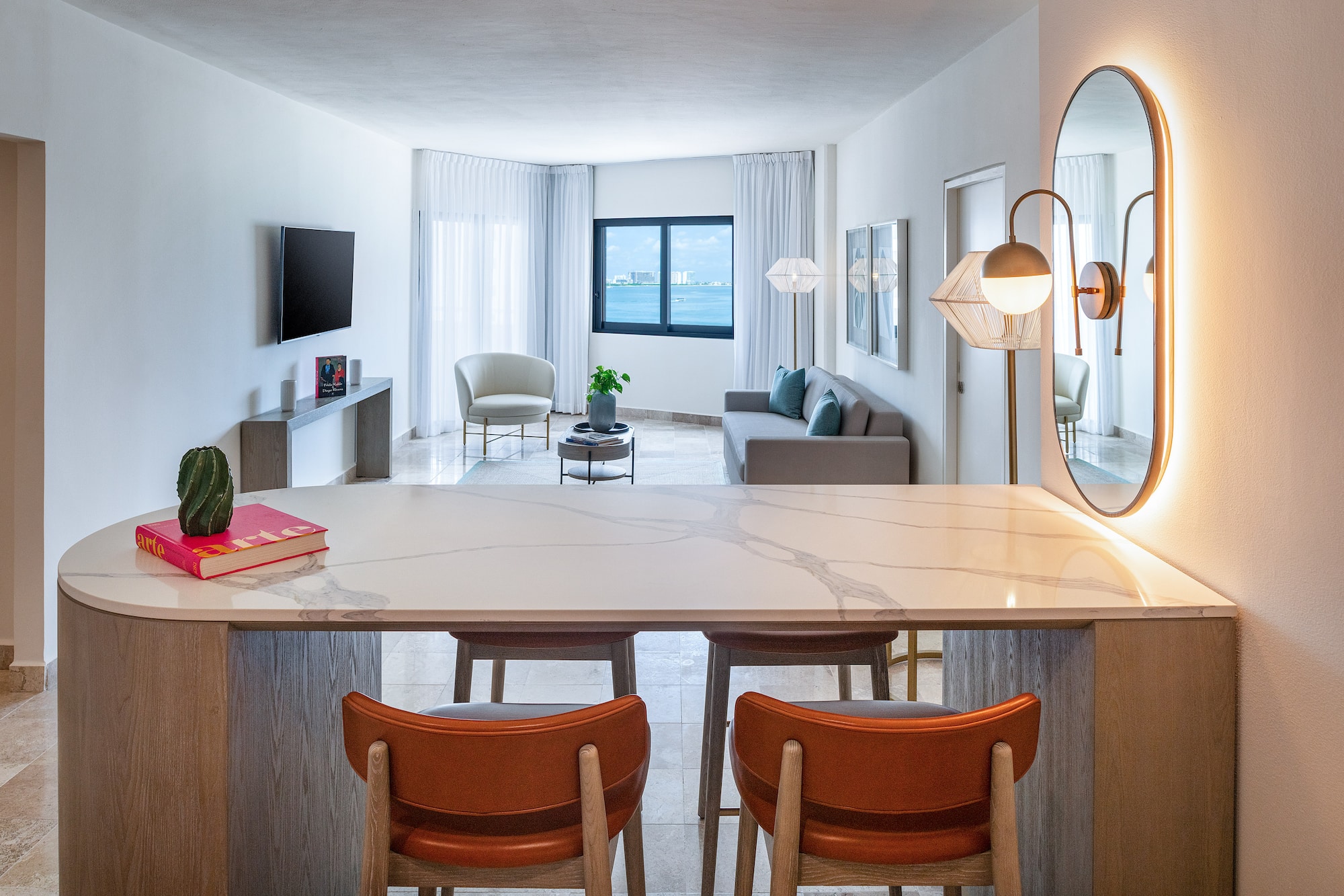 a room with a table and chairs