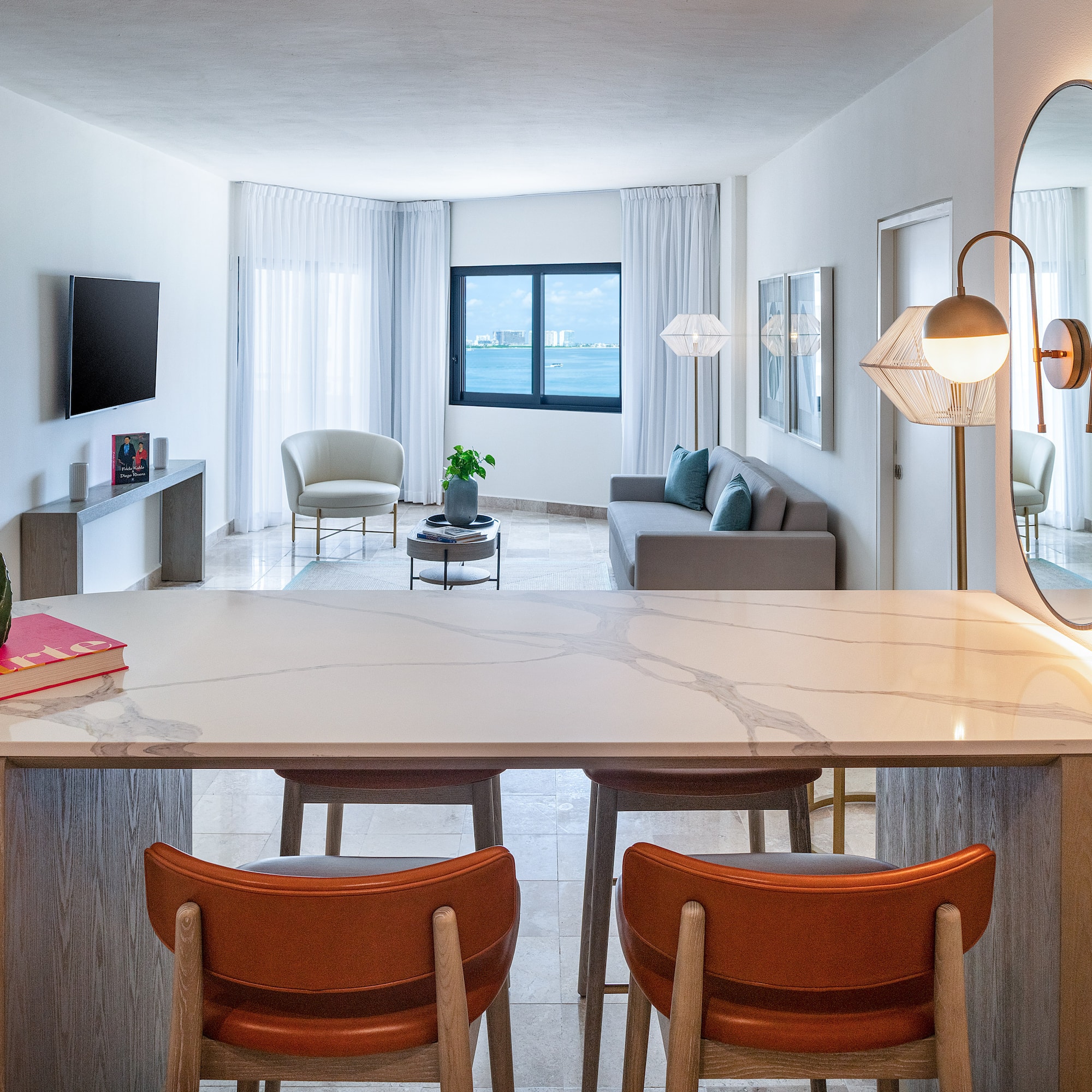 a room with a table and chairs