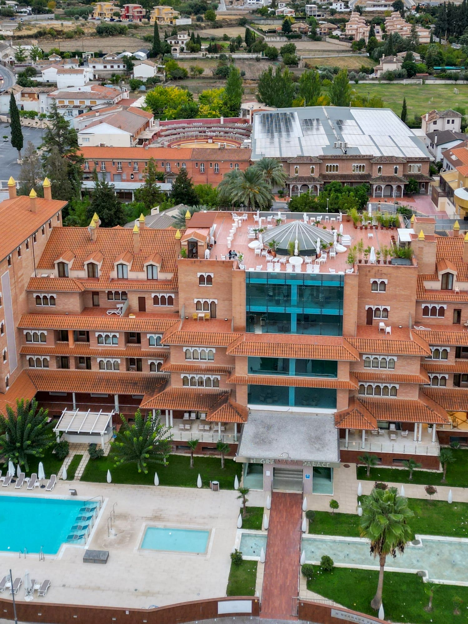 a large building with a pool in the middle