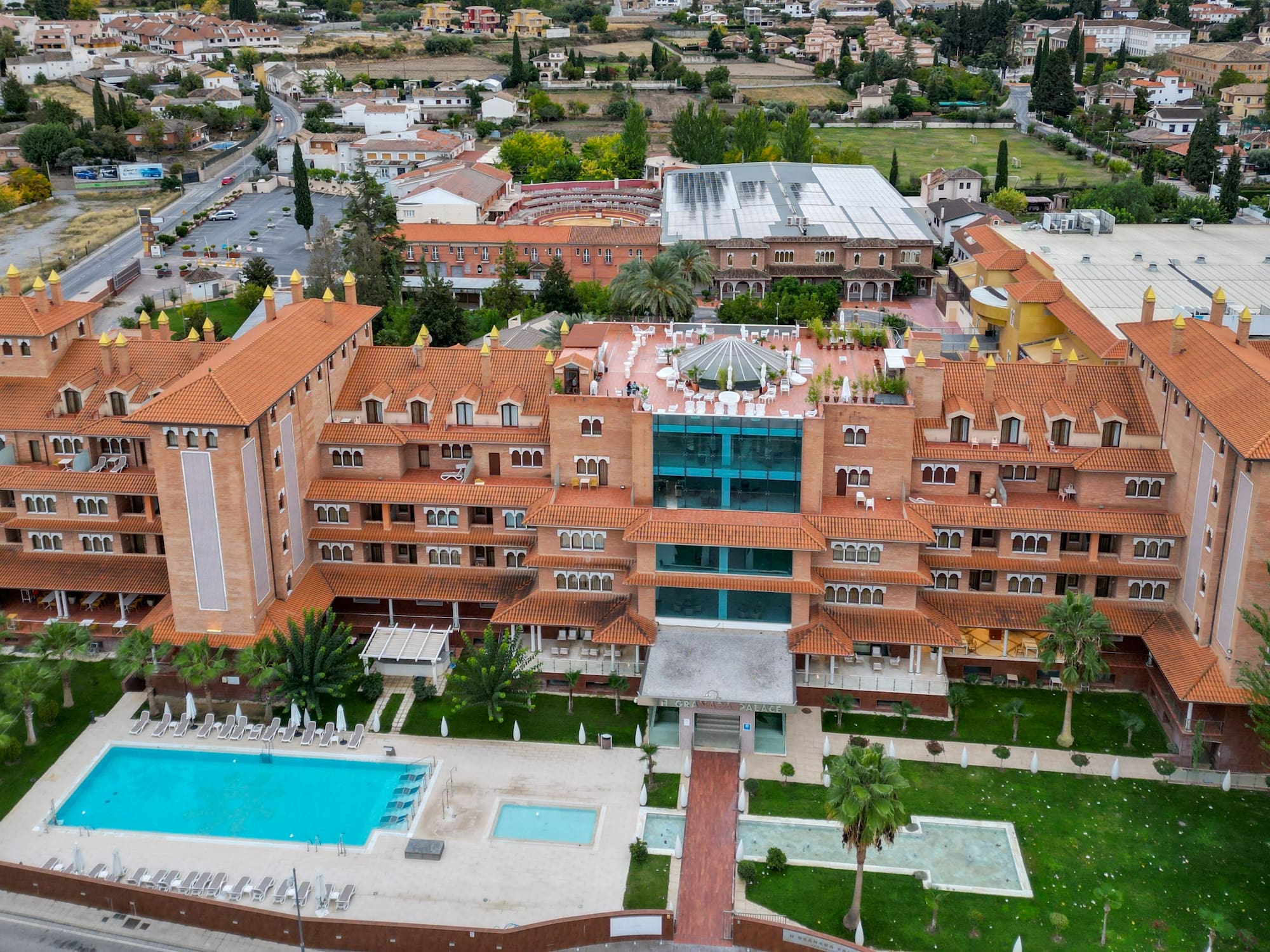 a large building with a pool in the middle