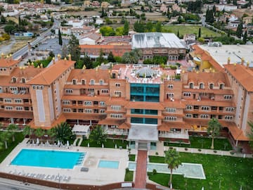 a large building with a pool in the middle