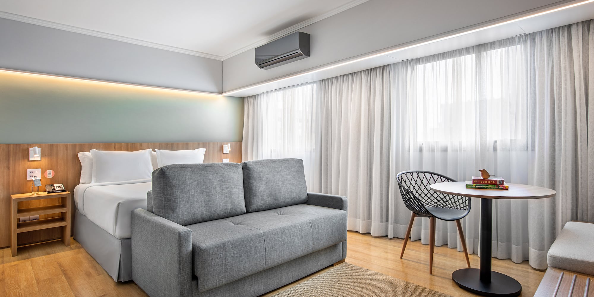 a room with a bed and a table