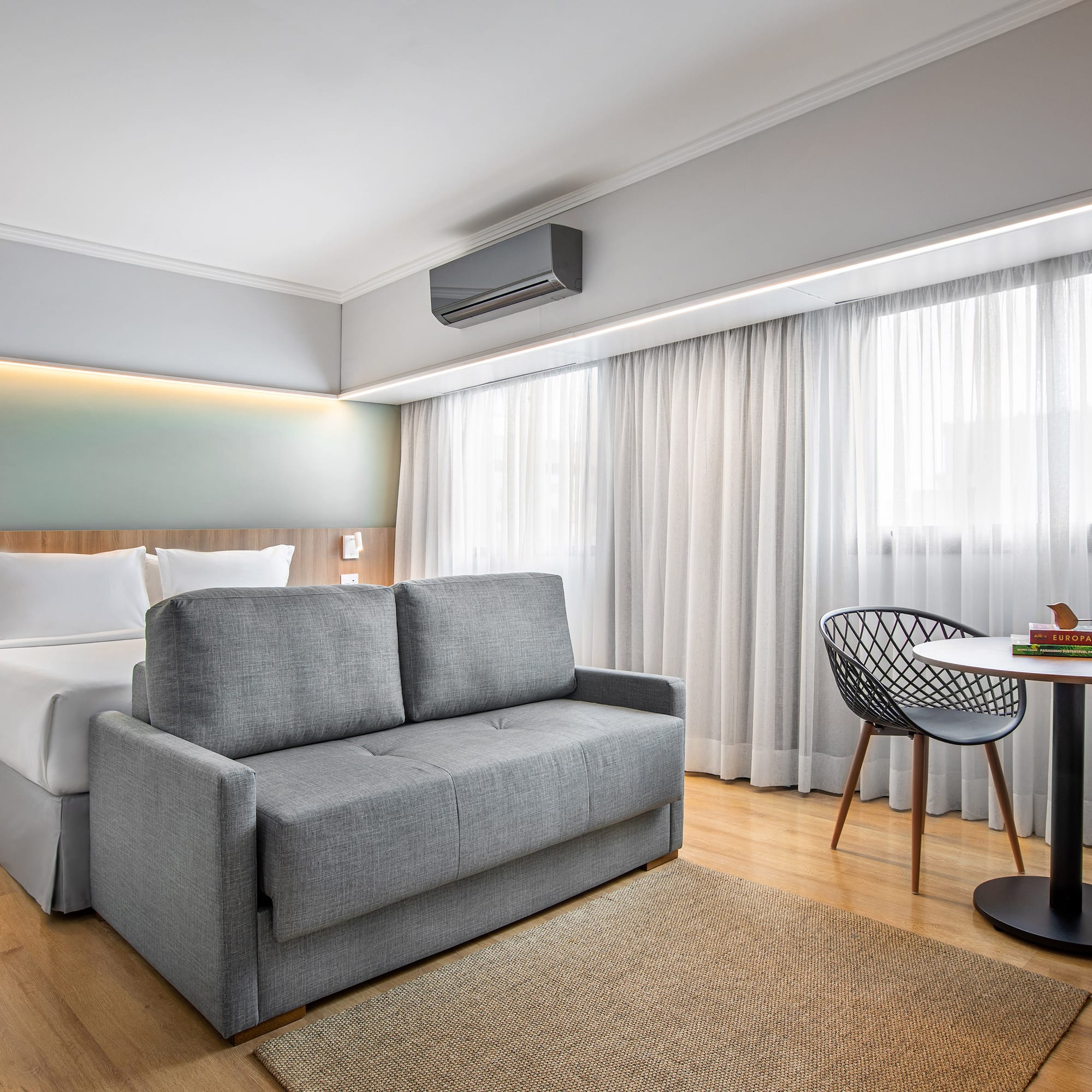 a room with a bed and a table