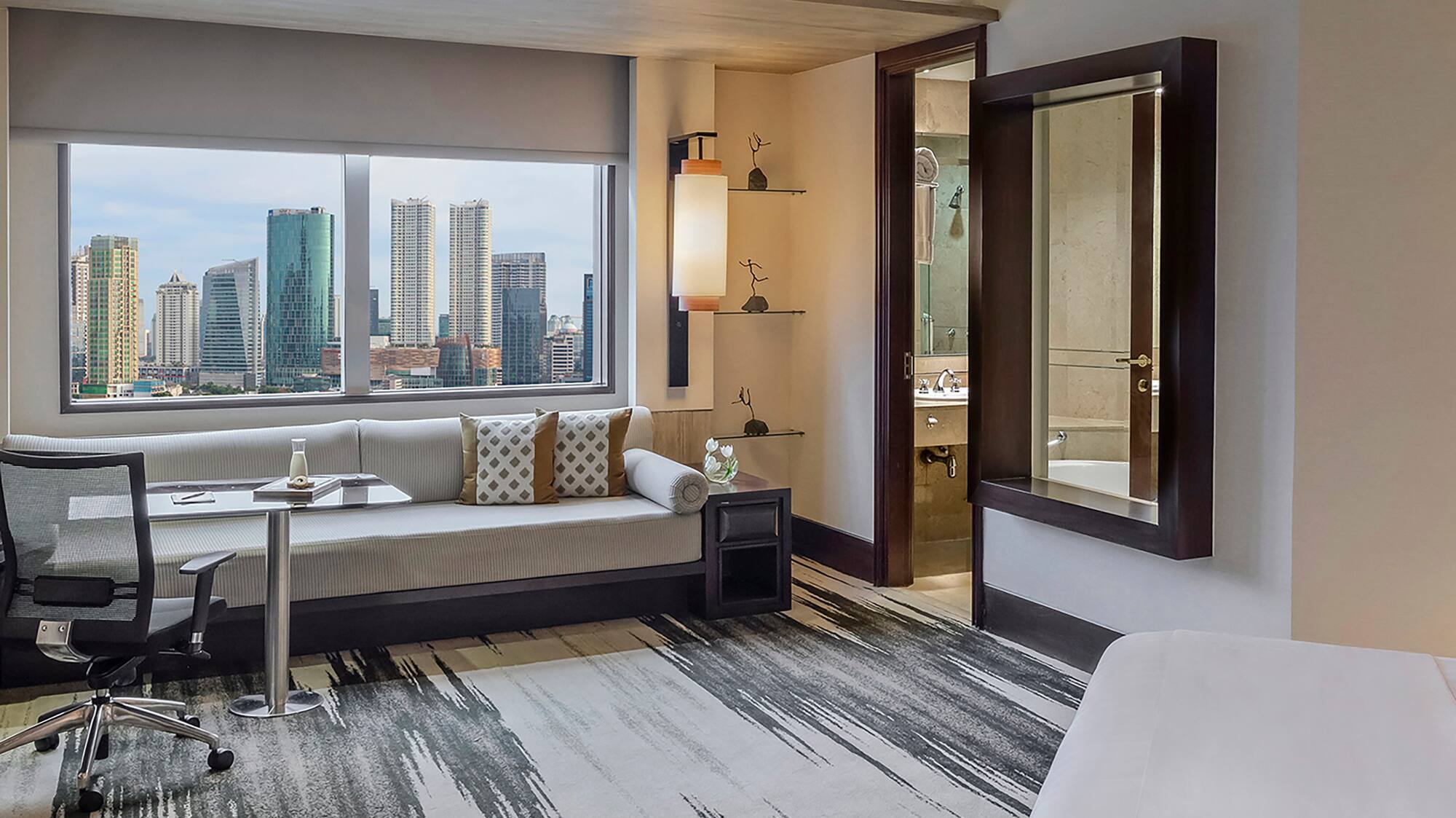 a room with a bed and a chair