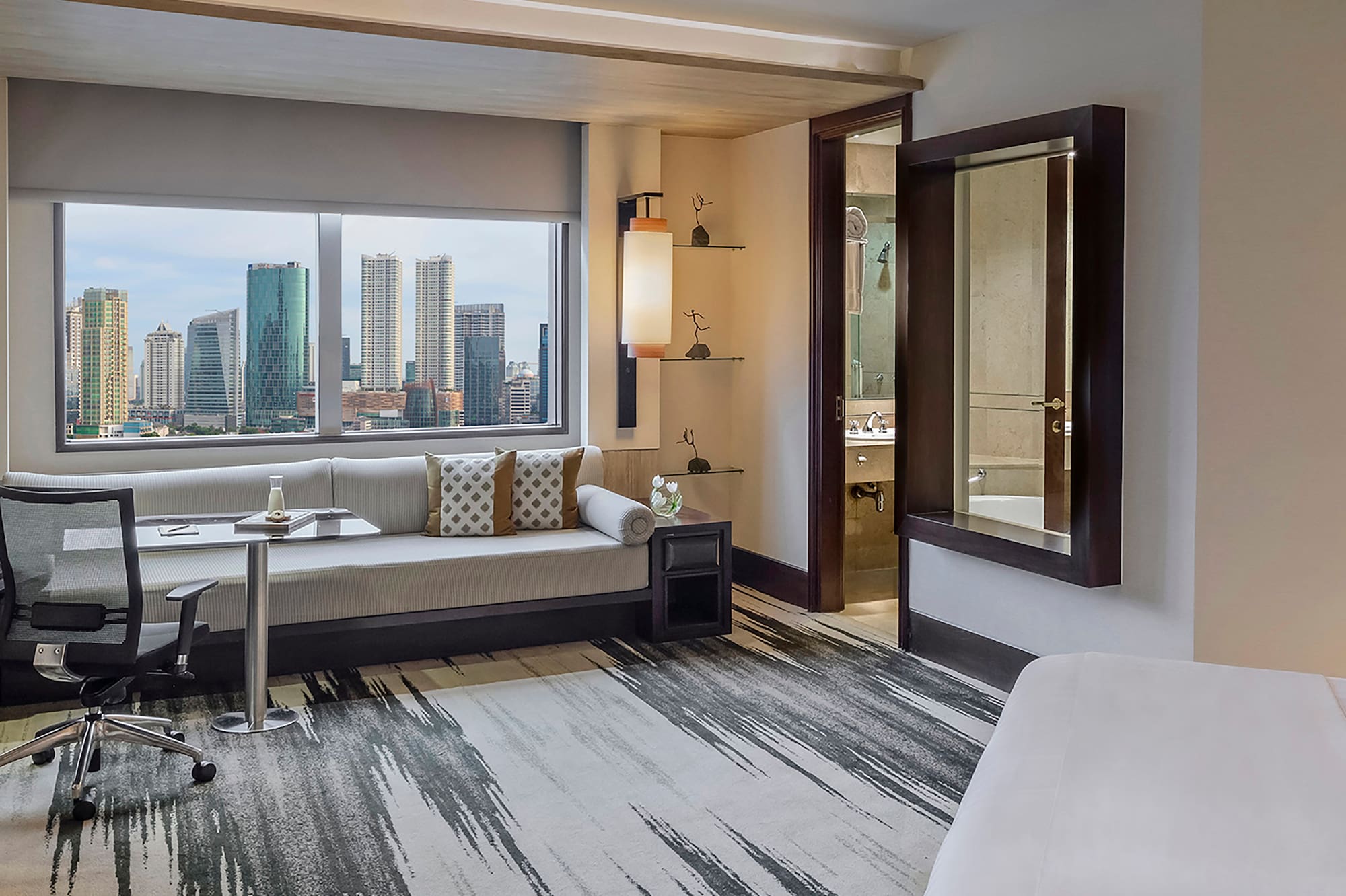 a room with a bed and a chair