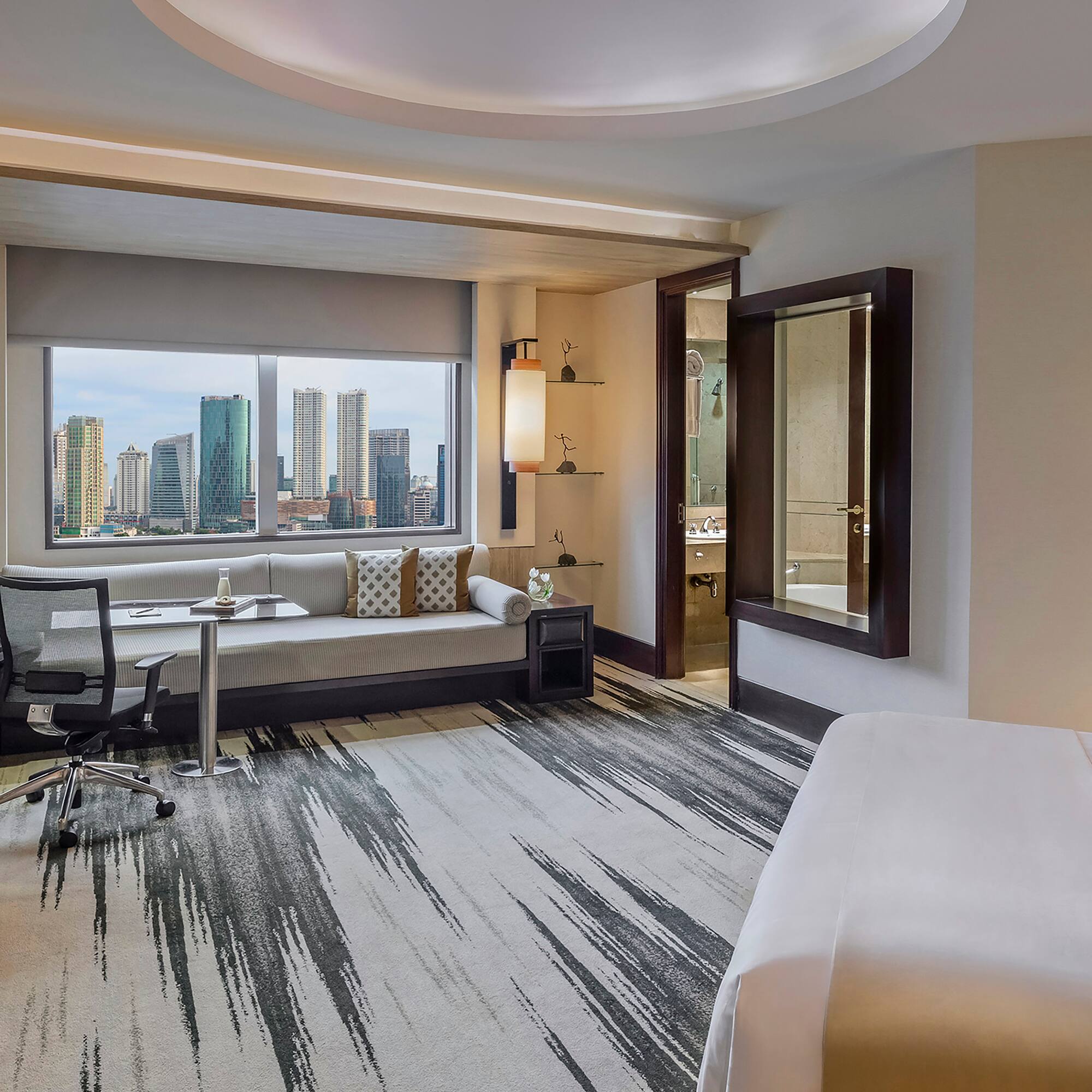 a room with a bed and a chair