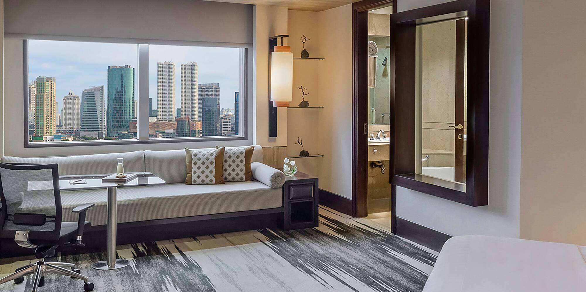 a room with a bed and a chair