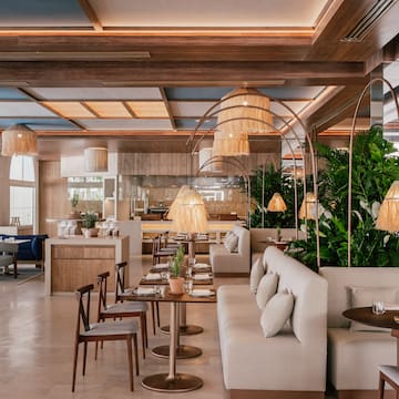 a room with tables and chairs