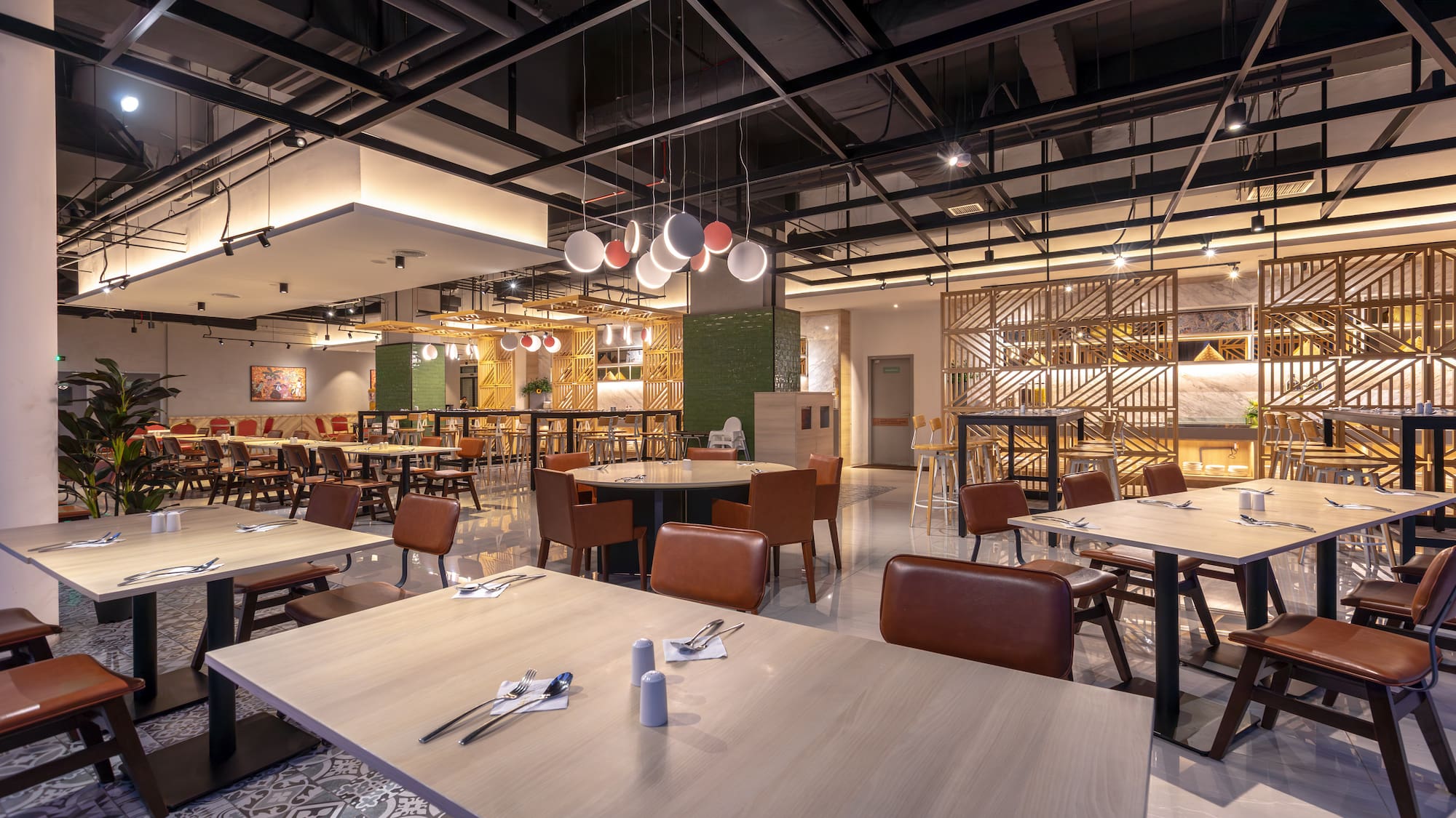 a restaurant with tables and chairs